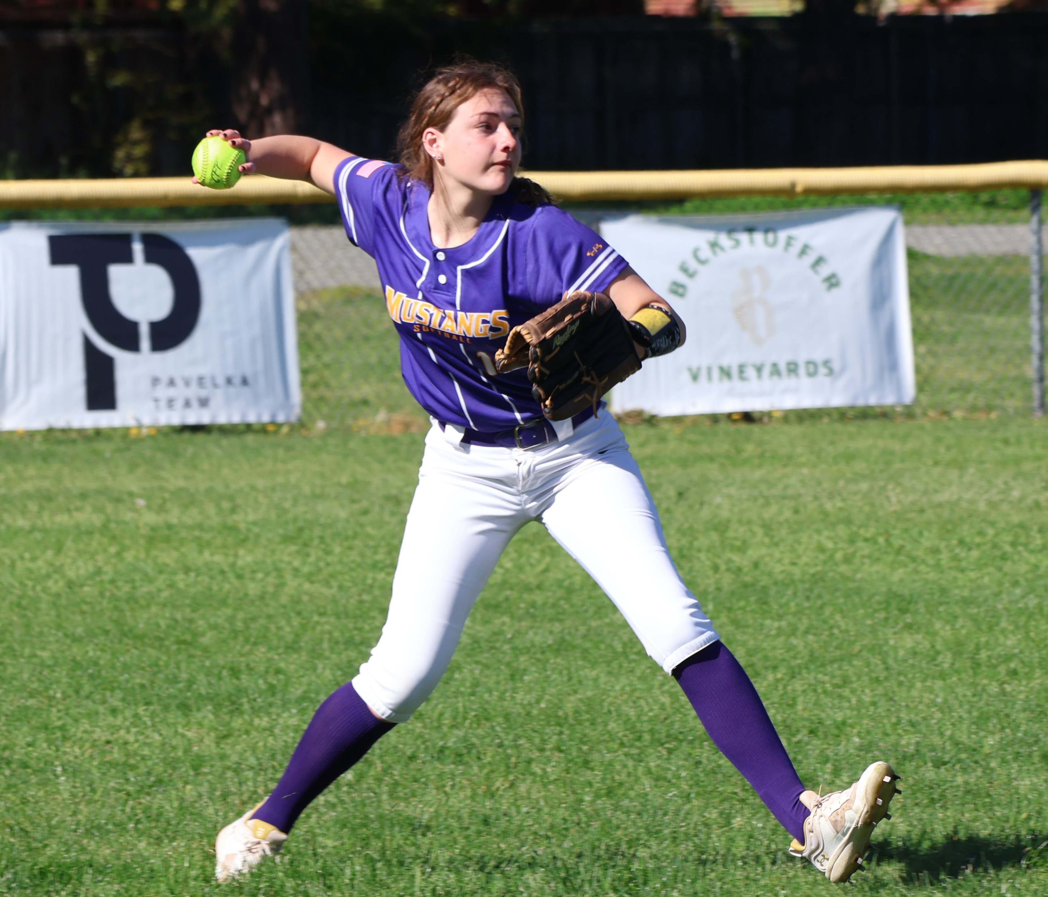 Middletown left fielder Cadence Henry throws the ball back into the infield after a Cloverdale hit. The Eagles banged out 16 hits in their 22-2 victory in five innings. (Photos by Brian Sumpter)