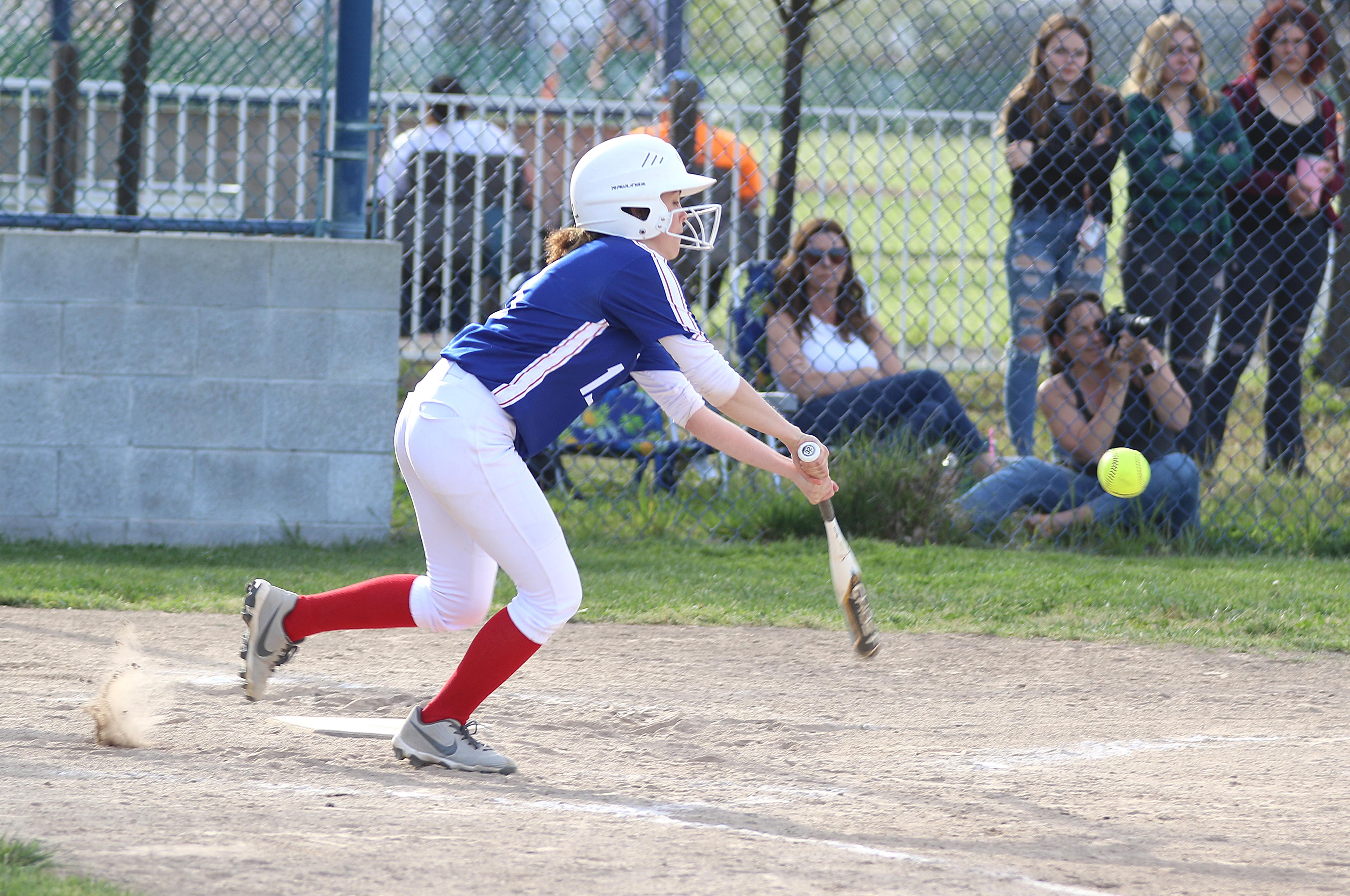 Lower Lake's Shaye Tubbs puts the ball into play against Cloverdale. (Photos by Minenna Photography)