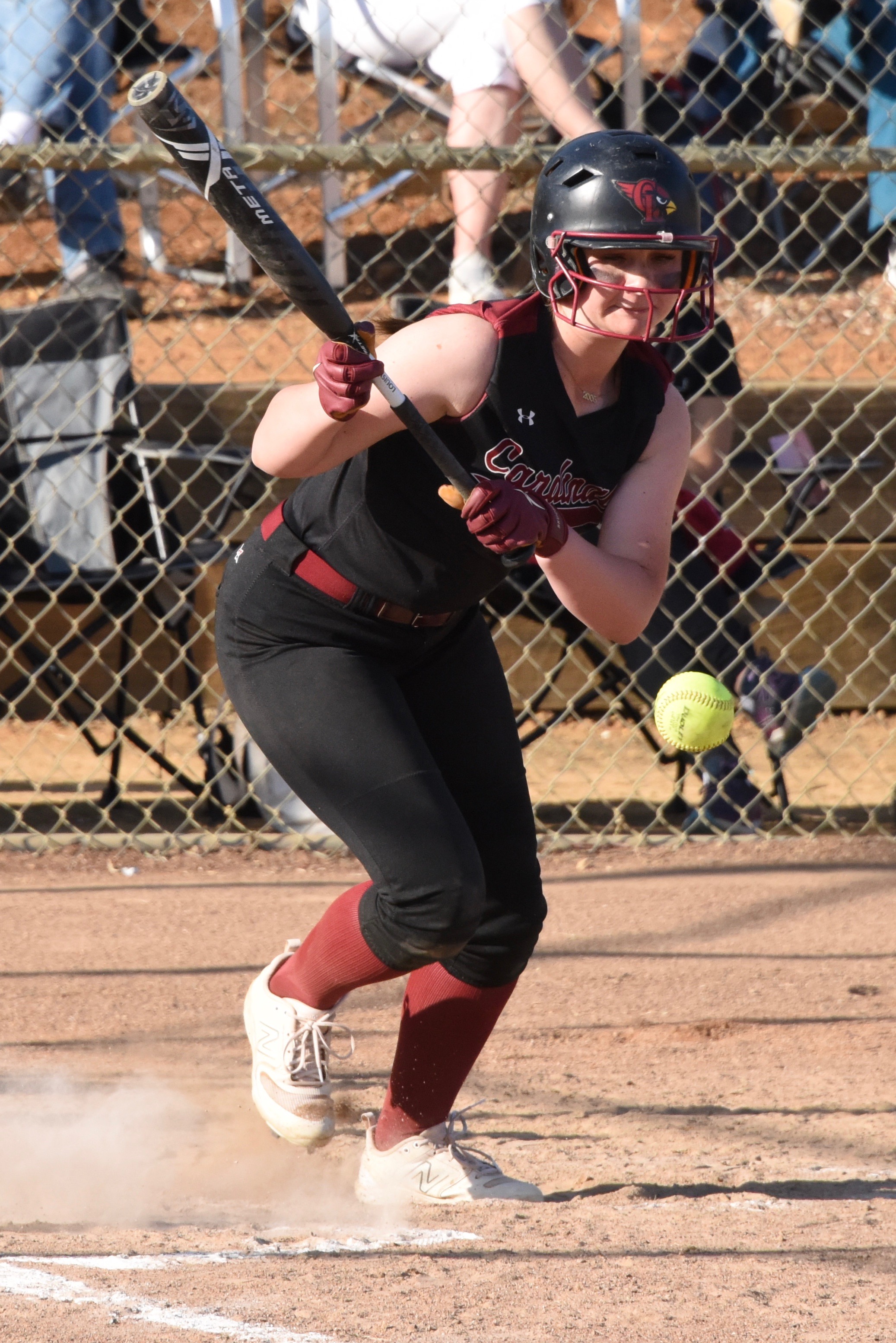 Camrin Pivniska bunts for a single in the bottom of the fifth inning. (Photos courtesy of Trett Bishop)