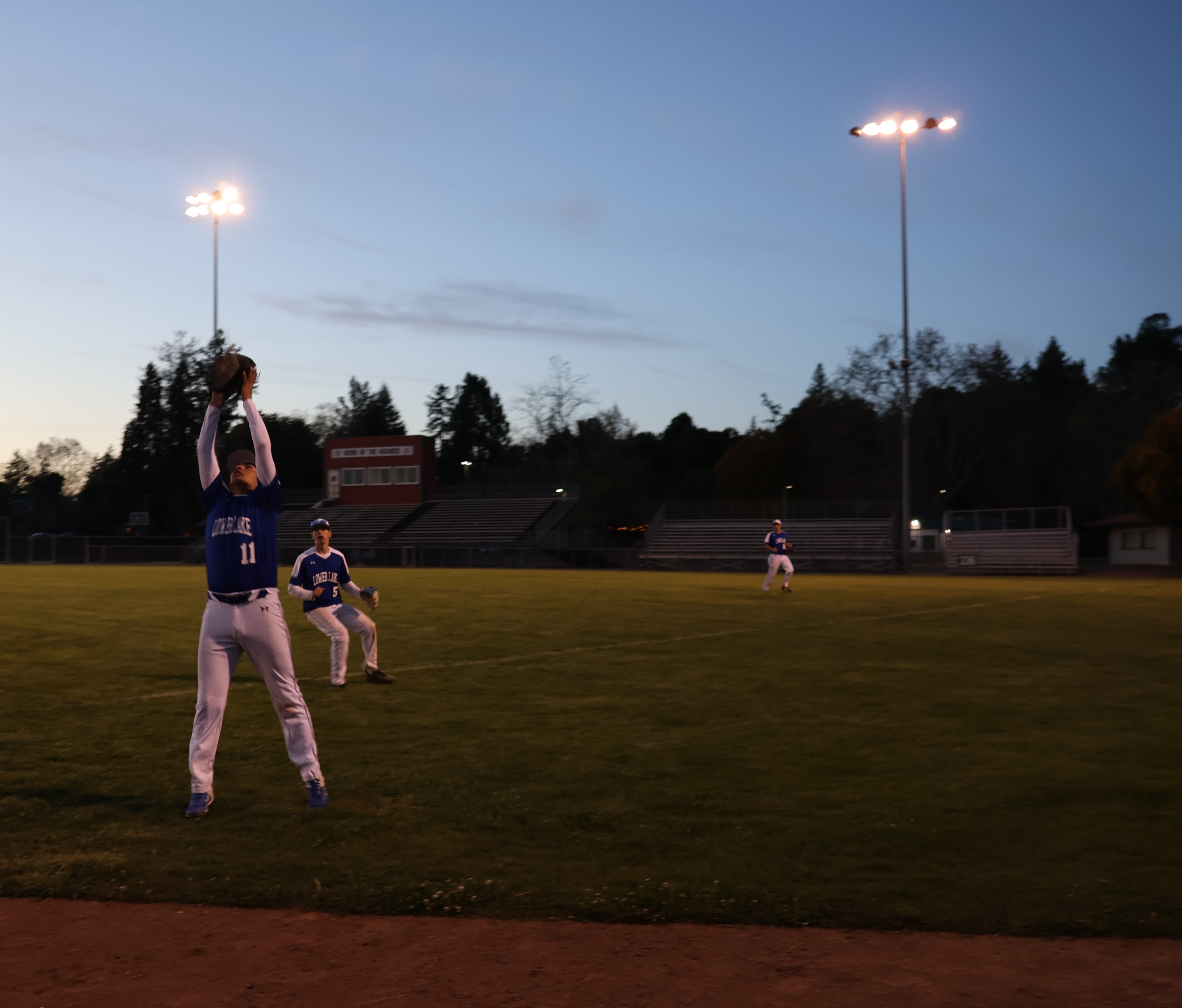 Lower Lake first baseman Edward Gutierrez gloves a foul popup as second baseman Charles Jones (5) backs him up. (Photos by Brian Sumpter)