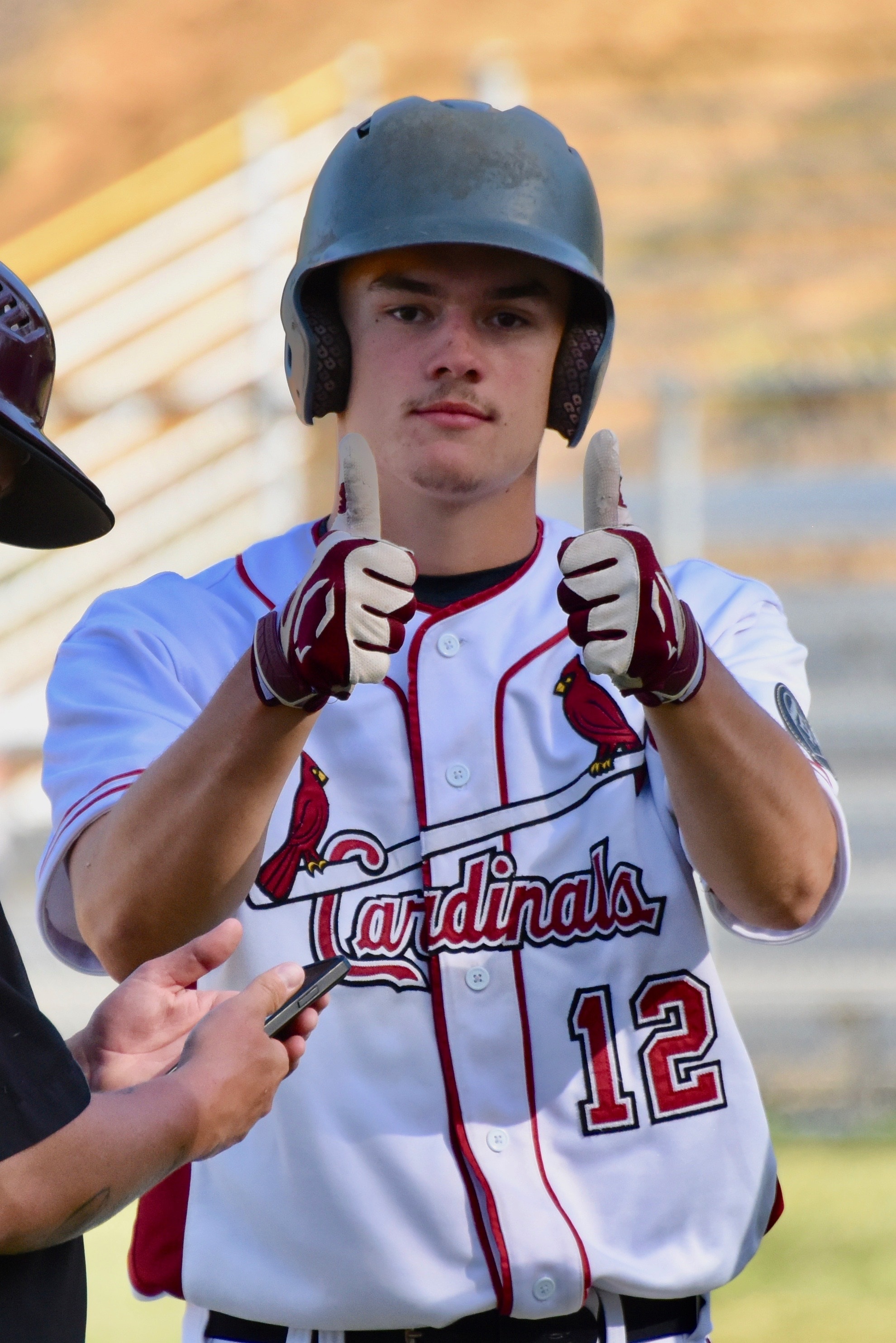 Clear Lake's Cody Hayes gives a double thumbs up for the double he hit Thursday afternoon against Middletown. (Photos courtesy of Trett Bishop)