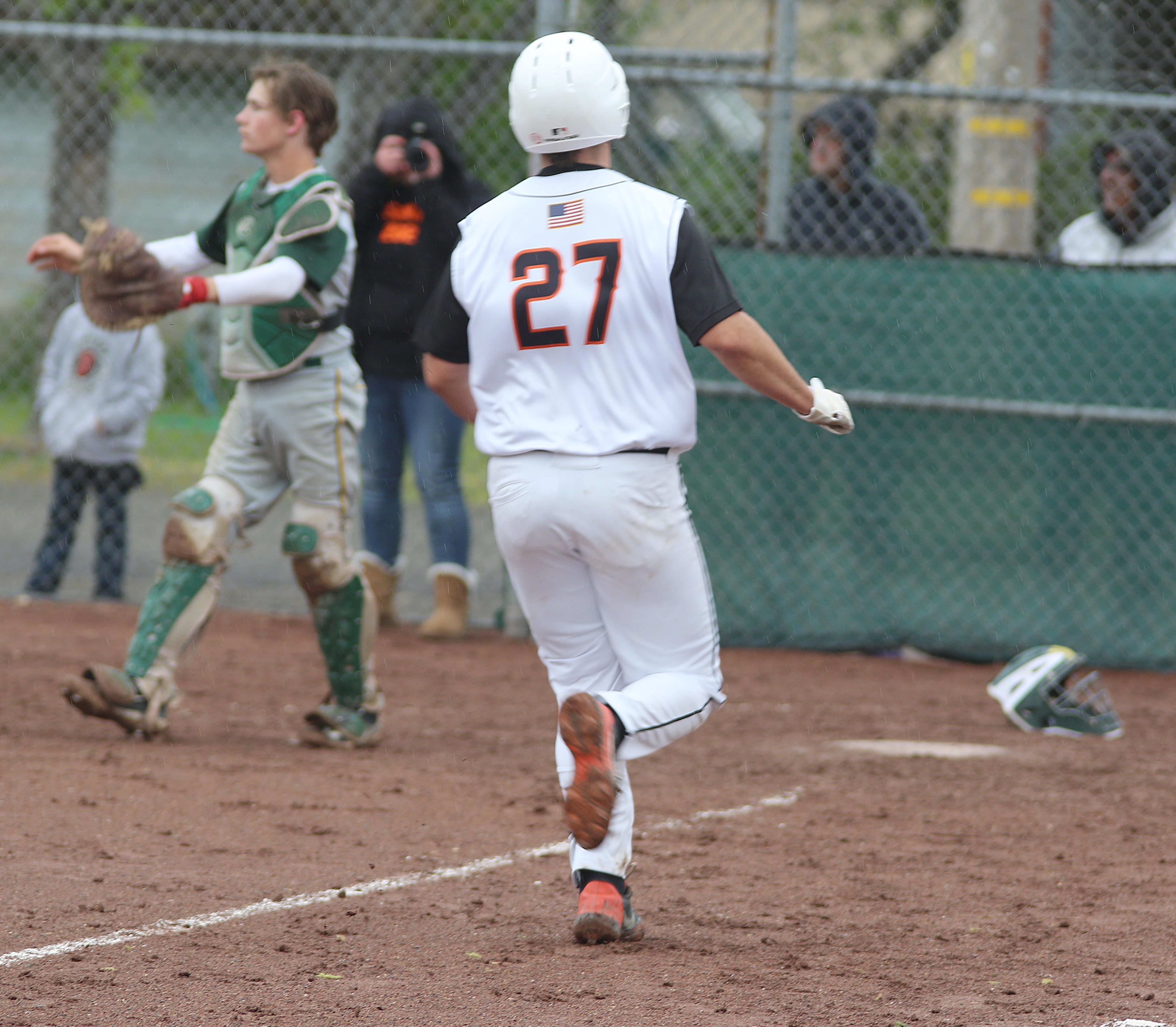 Zayne Barker scores a run for Kelseyville in its 9-2 win over Willits. Barker went 2-for-3 with a double and a RBI in the Knights' 12th victory in a row. (Photos by Minenna Photography)