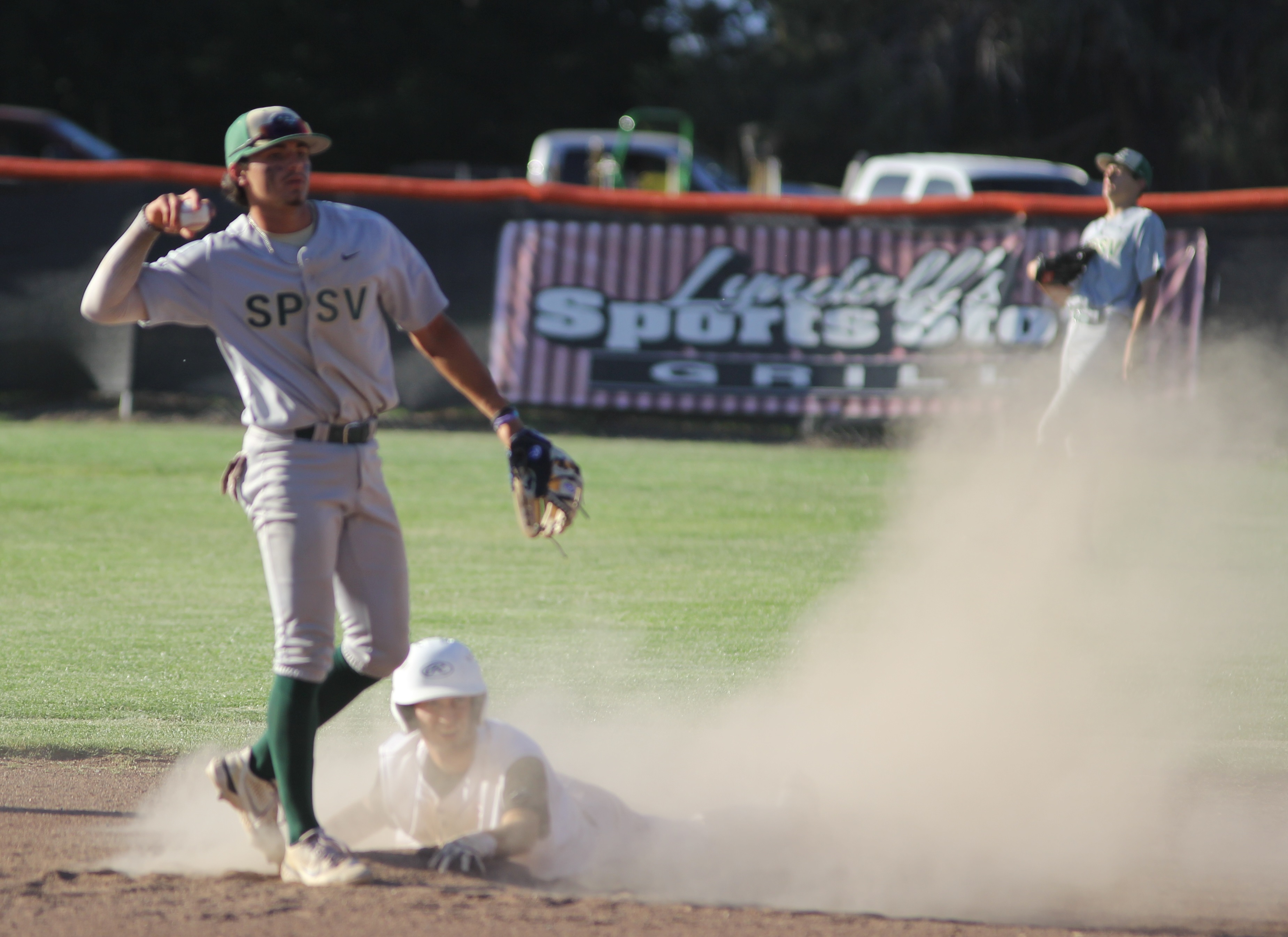 Kelseyville's Andrew Huggins was safe at second base advancing on a wild pitch in the bottom of the fourth inning. (Photos by Minenna Photography)