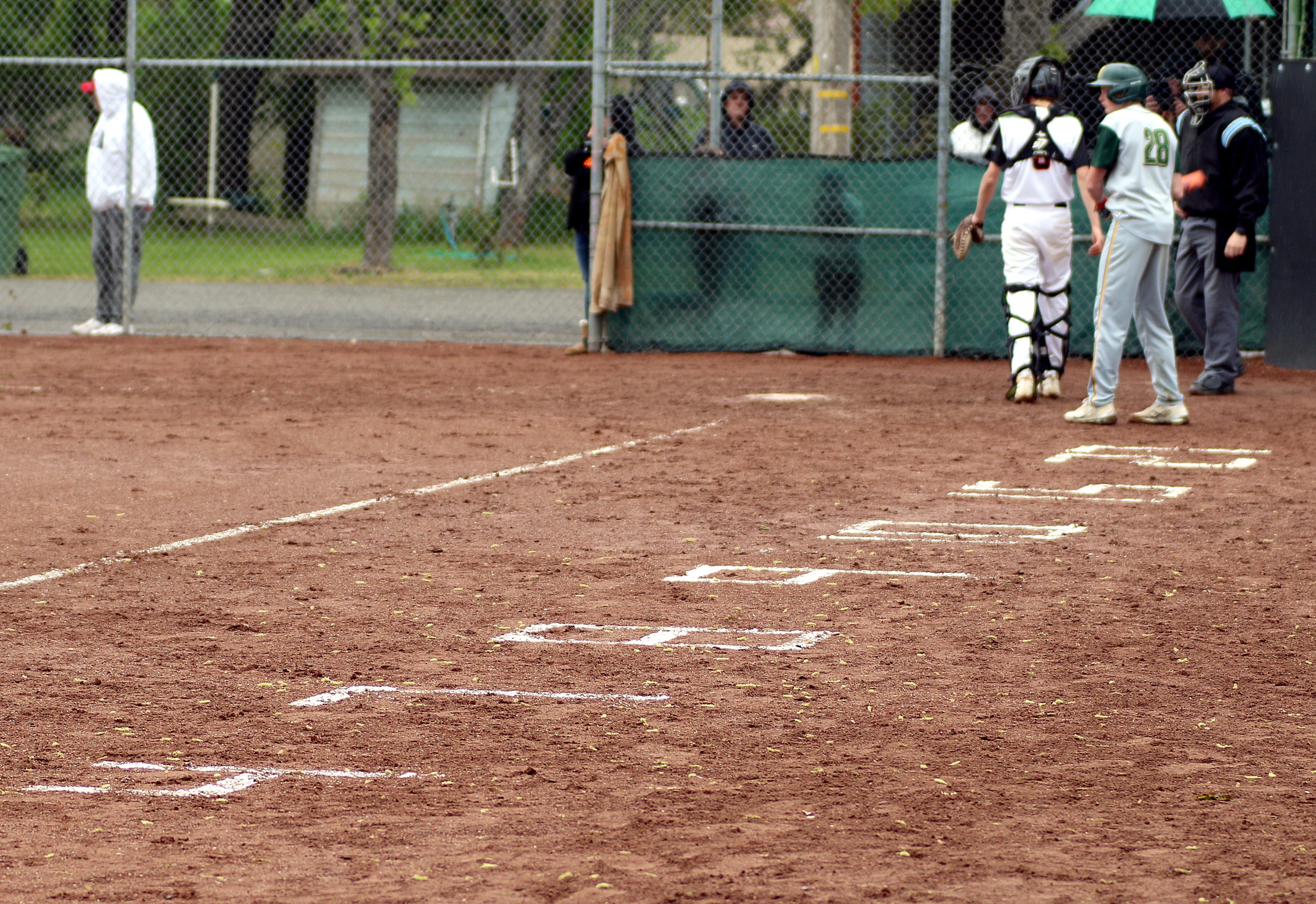 The numbers of Kelseyville's seven seniors were chalked along the third-base line during Friday's action against Willits. The Knights honored those seven seniors during their final home game of the regular season. They are Jake Burke (4), Luke Watkins (7), Alex Cabrera (8), Joey Gentle (9), Andrew Huggins (10), Jefke Schoonjans (15) and Zayne Barker (27). (Photos by Minenna Photography)