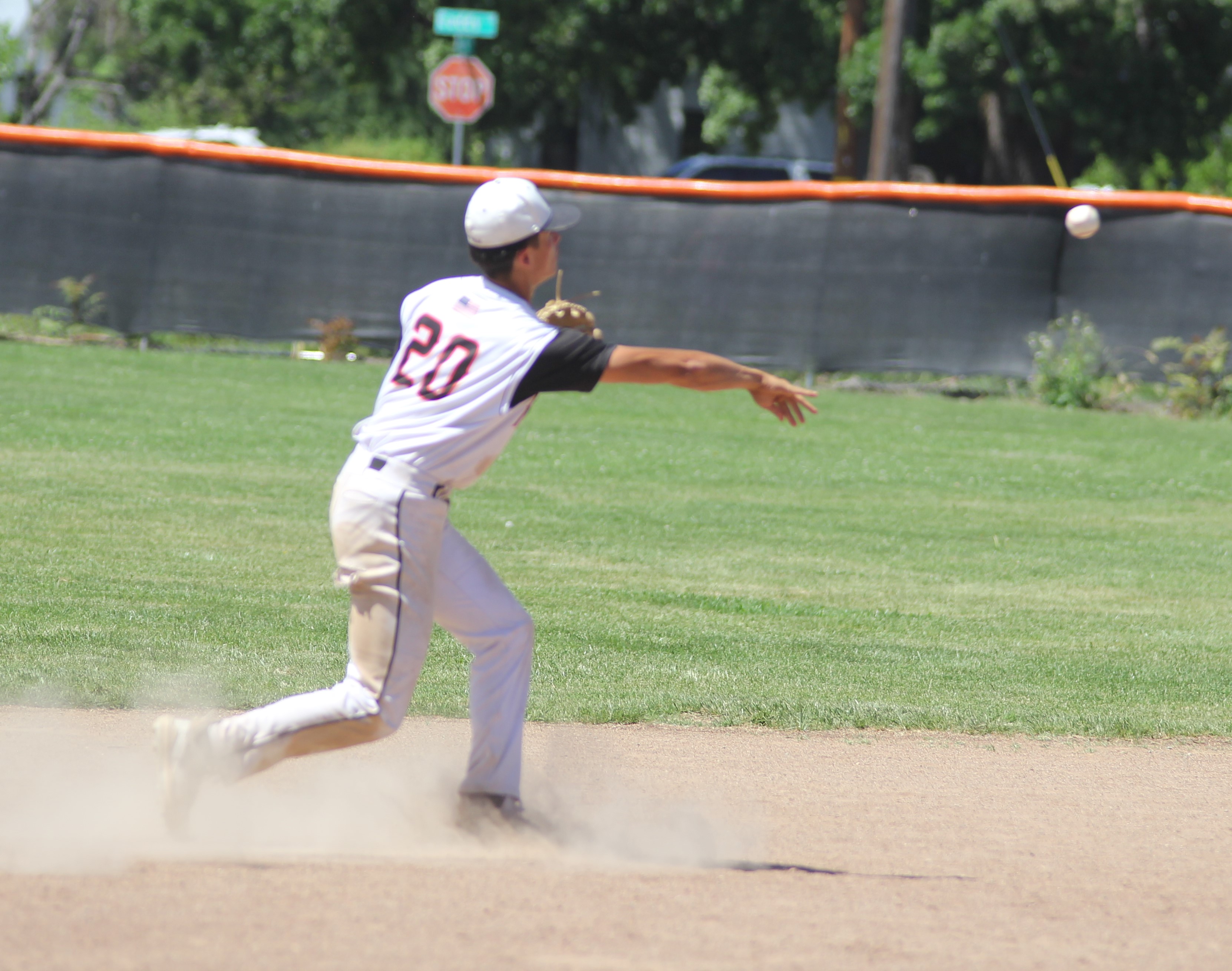 Kelseyville shortstop Kyle Watkins throws the ball to second base in the sixth inning to force a Justin-Siena runner. Watkins had one of only two hits for the Knights in their season-ending 5-1 loss to Justin-Siena in the quarterfinal round of the North Coast Section Division 4 playoffs at Lloyd Larson Field. (Photos by Minenna Photography)
