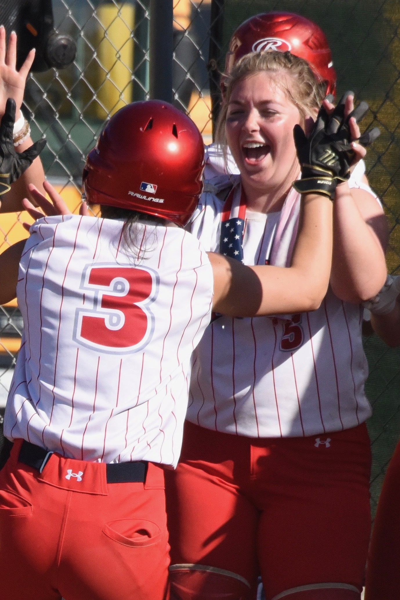 Upper Lake's Maddy Young (3) and Ruby Wurm celebrate during a league win over Credo earlier this season. The North Central League II-champion Cougars are home Wednesday at 5 p.m. to play St. Vincent of Petaluma in the first round of the North Coast Section Division 5 softball playoffs. (Photo courtesy of Trett Bishop)