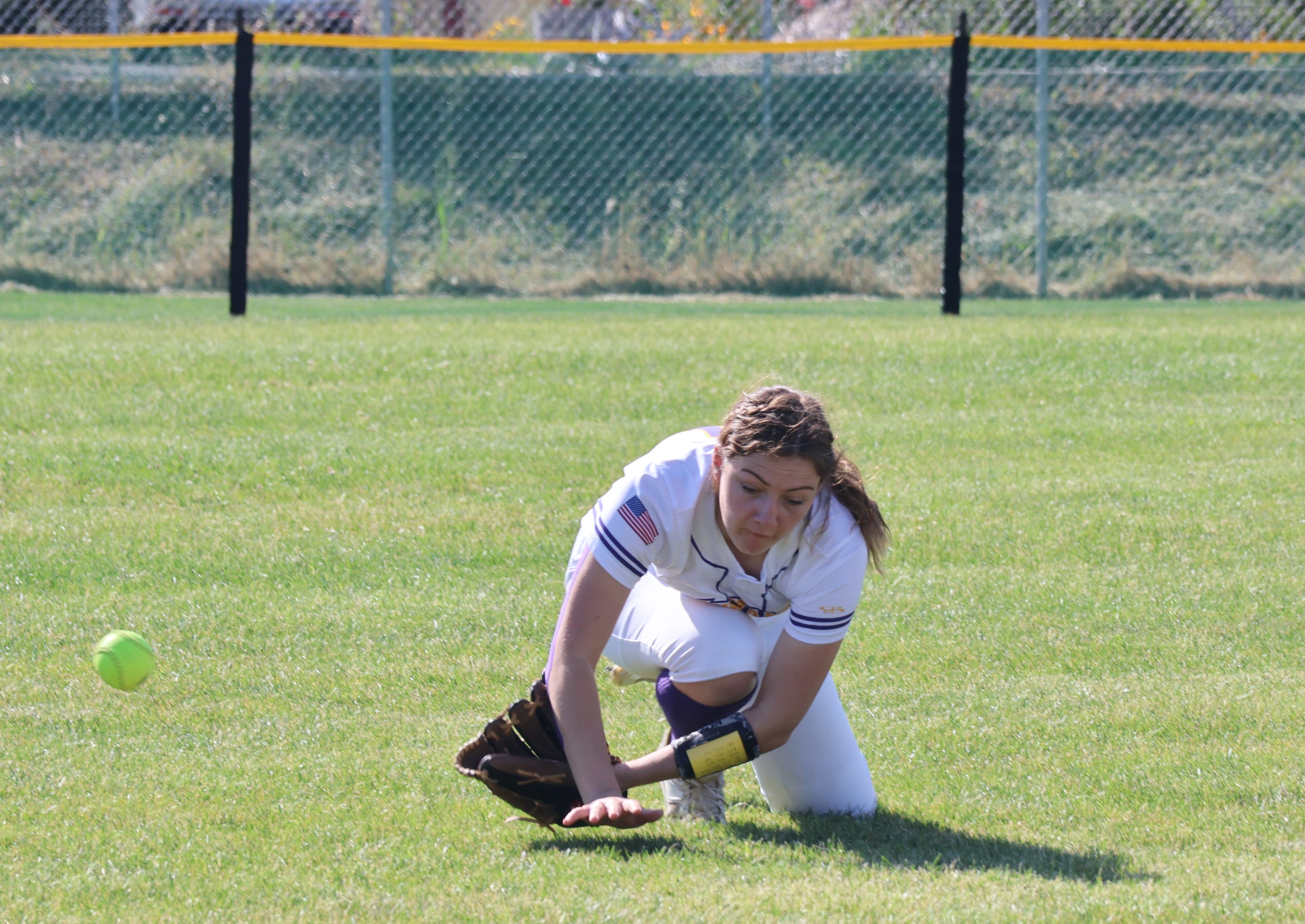 Despite a good effort, Middletown left fielder Cadence Henry couldn't come up with the catch on this play Wednesday afternoon during a 12-1 loss to Cloverdale. (Photos by Brian Sumpter)