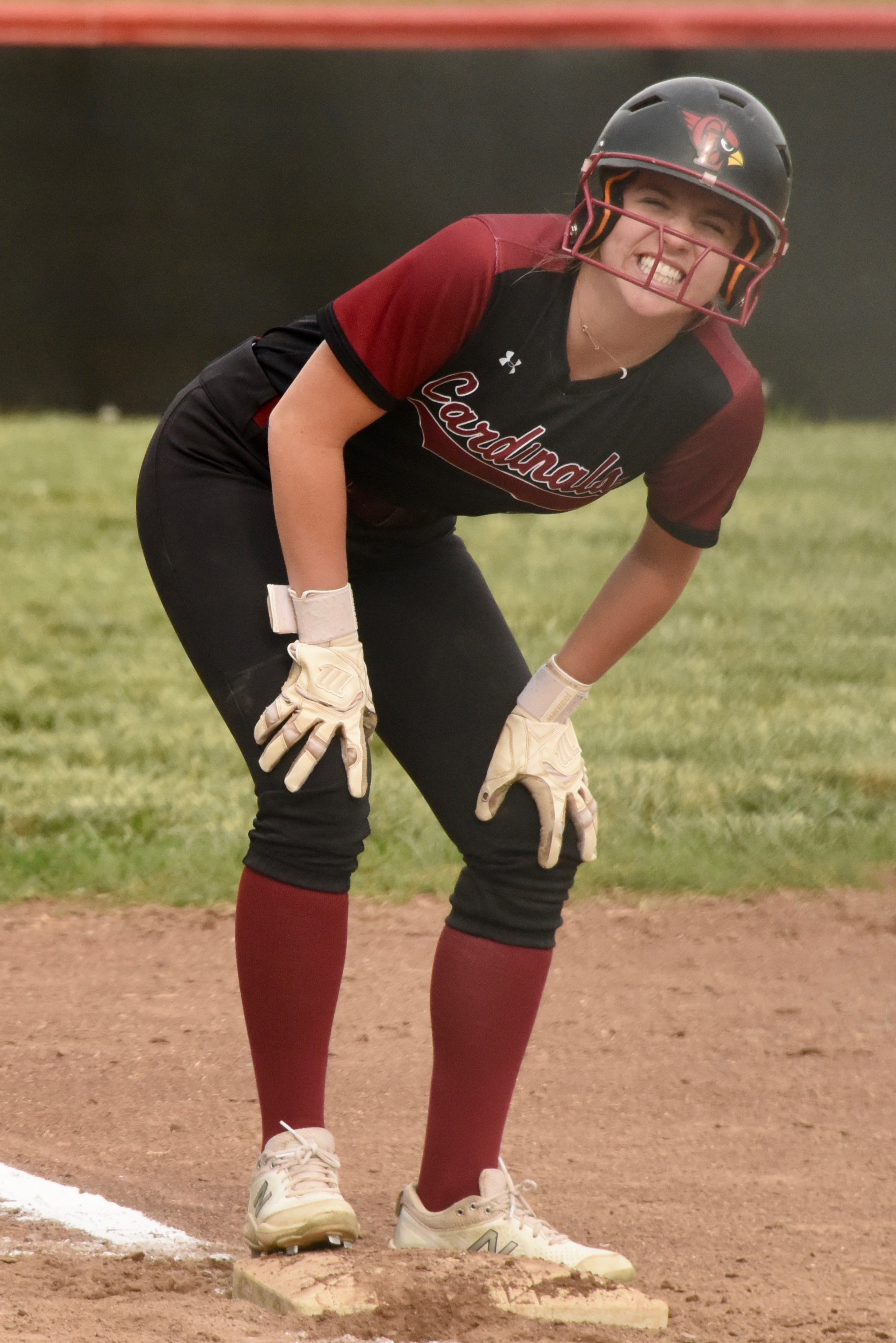 Yeah, it hurt a little bit. Clear Lake's Sierra Bruch grimaces while standing on third base in the sixth inning after taking a line drive off the leg while taking her lead in foul territory. (Photos courtesy of Trett Bishop)