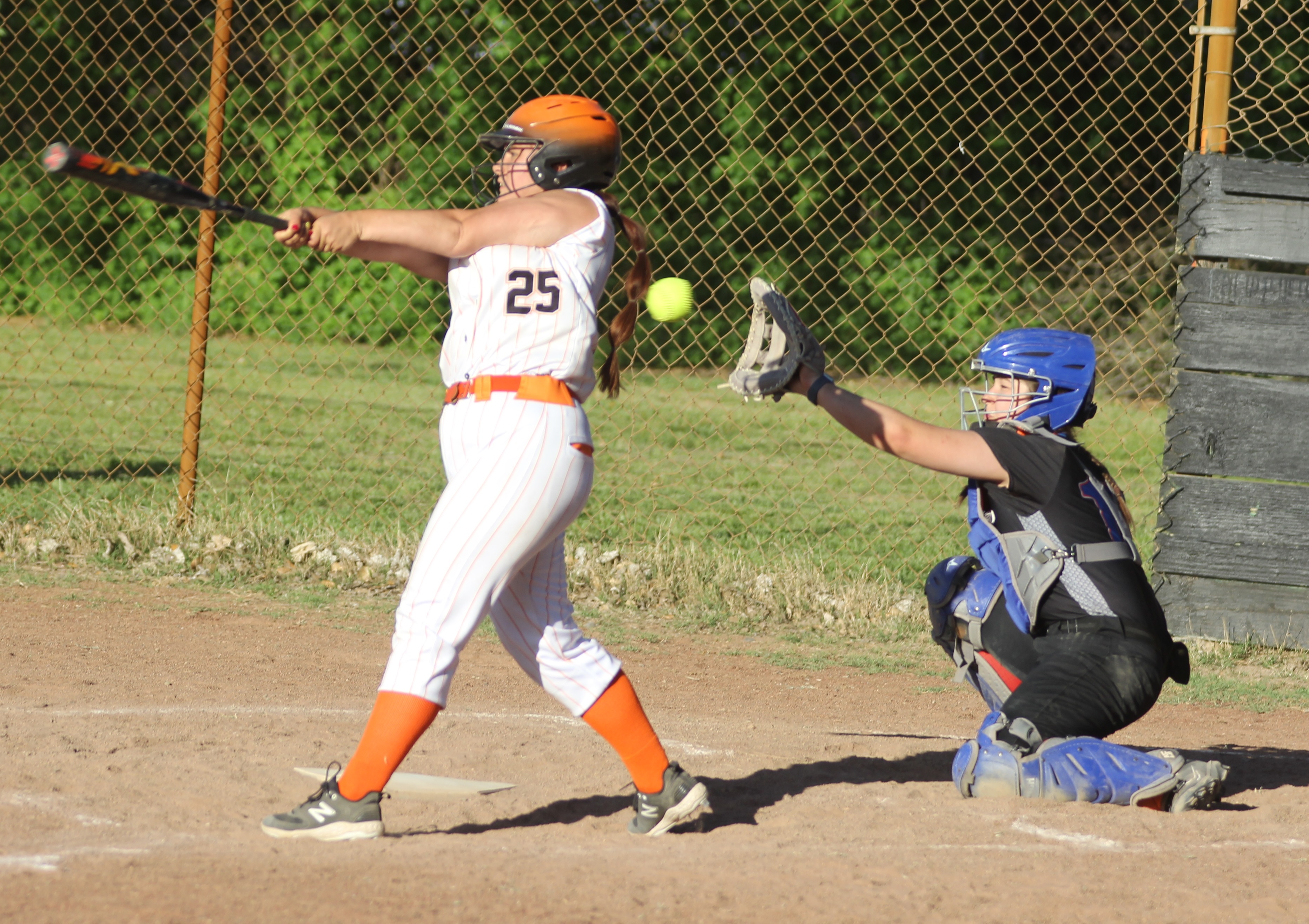 Kelseyville's Ana Ray swings through a pitch in the bottom of the sixth inning. (Photos by Minenna Photography)
