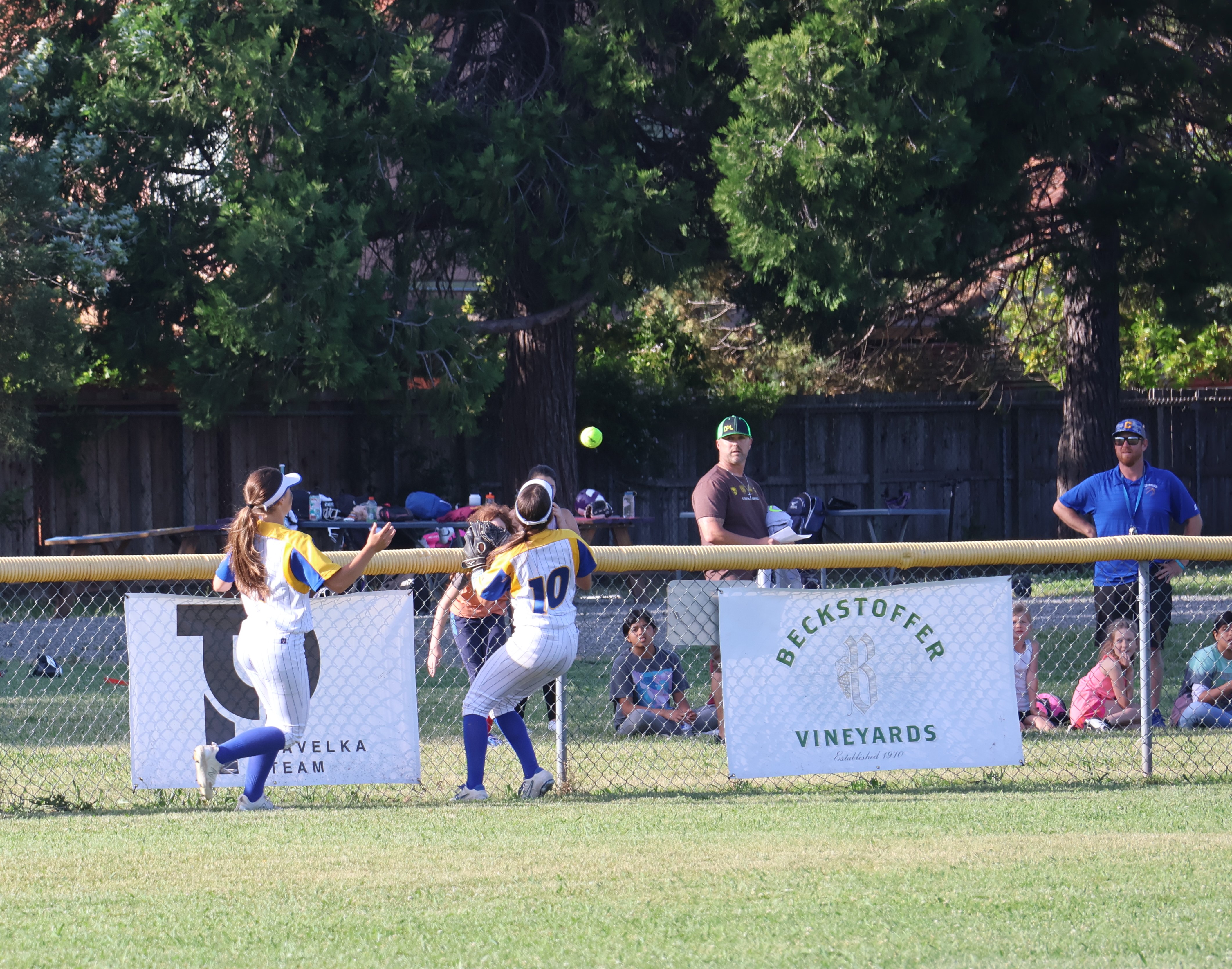 Cloverdale center fielder Trinity Vlasak plays Amber Smart's double off the fence in the top of the seventh inning, one of only two Clear Lake hits in the Cardinals' 8-0 season-ending loss to the Eagles on Tuesday in the semifinal round of the North Coast Section Division 5 playoffs at Cloverdale. (Photos by Brian Sumpter)