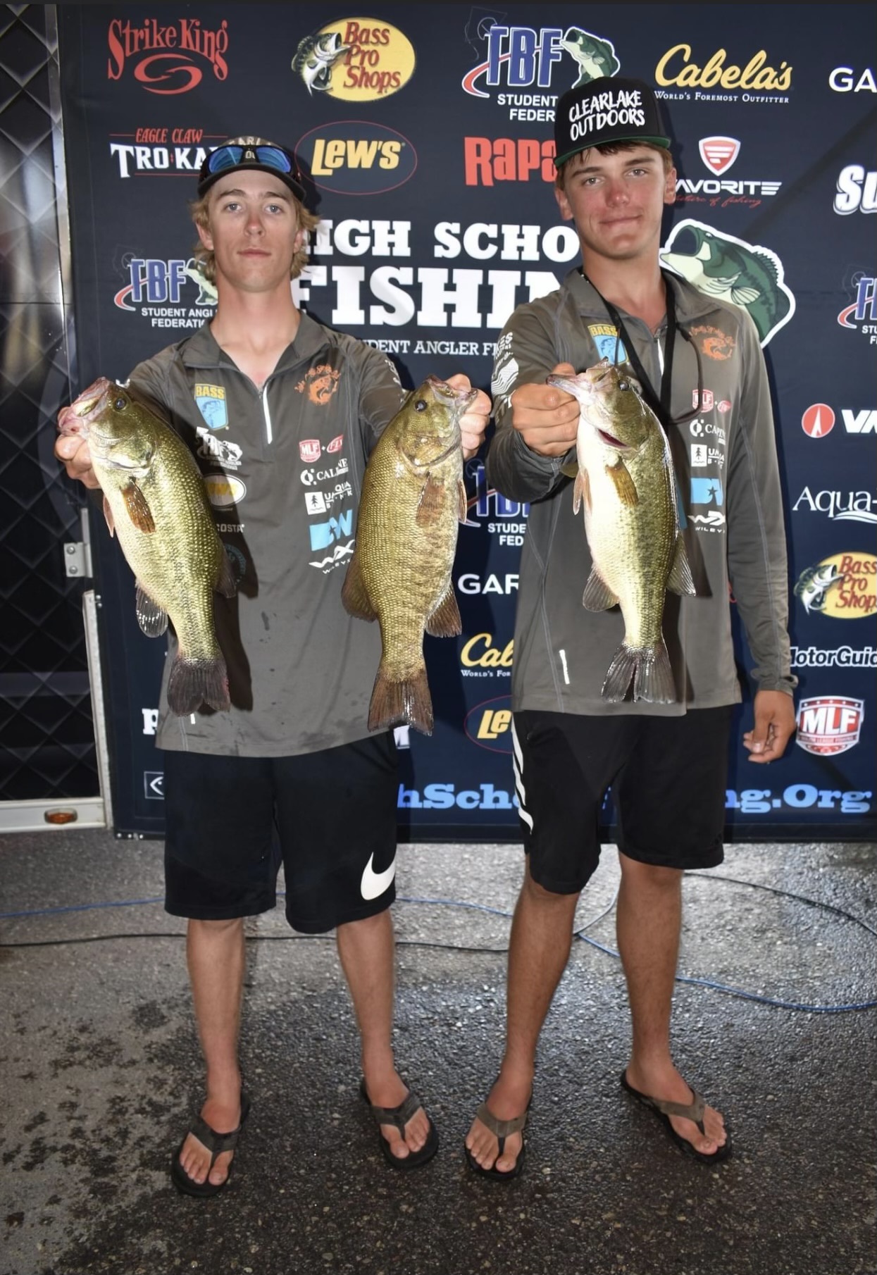 Joey Gentle (left) and Tyler Bryant hold up their day's catch Friday during the second-chance weigh-in at the National Championships and World Finals. (Courtesy photos)