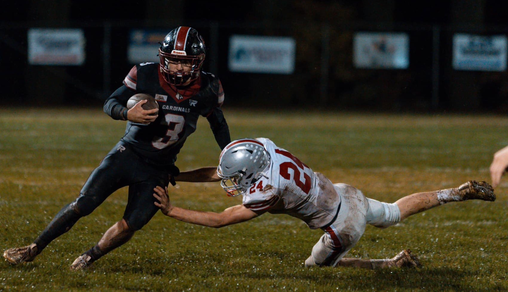 CLHS's Hank Ollenberger running against a Ferndale defender during the Cardinals' home playoff loss Friday. (Photo courtesy of Coral Leigh Photography)