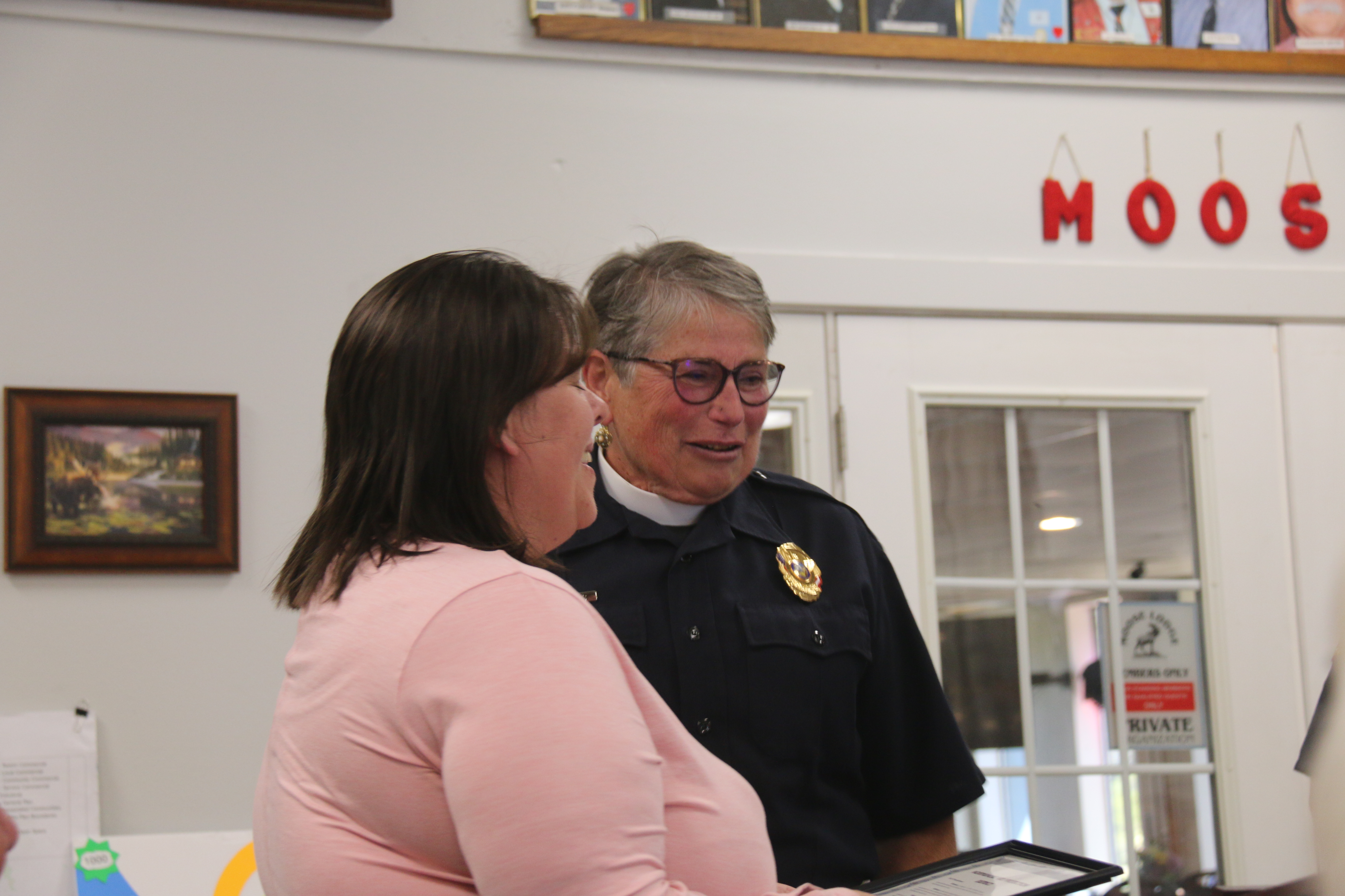 Left, Summer Trongo, Lake County Behavioral Health staffer, and Cindy Storrs, N. Shore Fire District staffer at recognition of Trongo by N. Shore Fire for distinction for her help of traffic accident victims, at Moose Lodge, May 1, 2024. William Roller- LAKE COUNTY PUBLISHING.