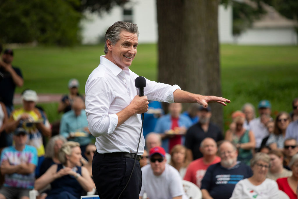 California Governor Newsom Campaigns For President Biden In Michigan earlier this year. A bill attempting to remedy California's ongoing gas price spikes nears a final vote, but questions have risen to the forefront. (Getty Images)