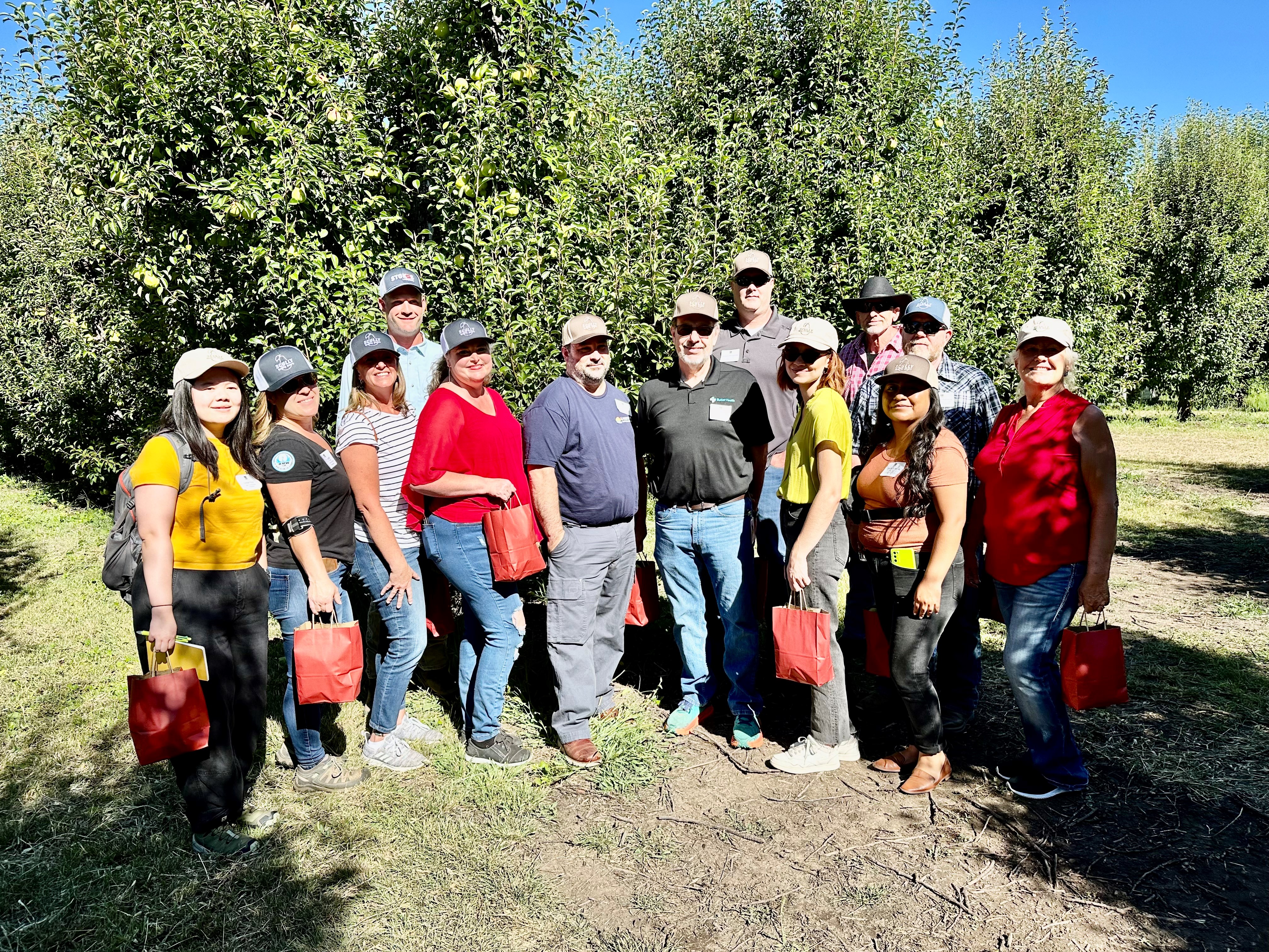 AgVenture Class of 2024 at Panella's Henderson Orchard, pictured from left: Lingzi Chen, Lisa Judd, Shannon Walker-Smith, Greg Panella (host), Trudy Wakefield, Matt Bullard, Tim Stephens, Lucas Bingham, Rhiannon Philippi, Dale Stoebe, Michael Sobieraj, Marilu Garcia, Helen Owen, PawanUpadhyay (not pictured).