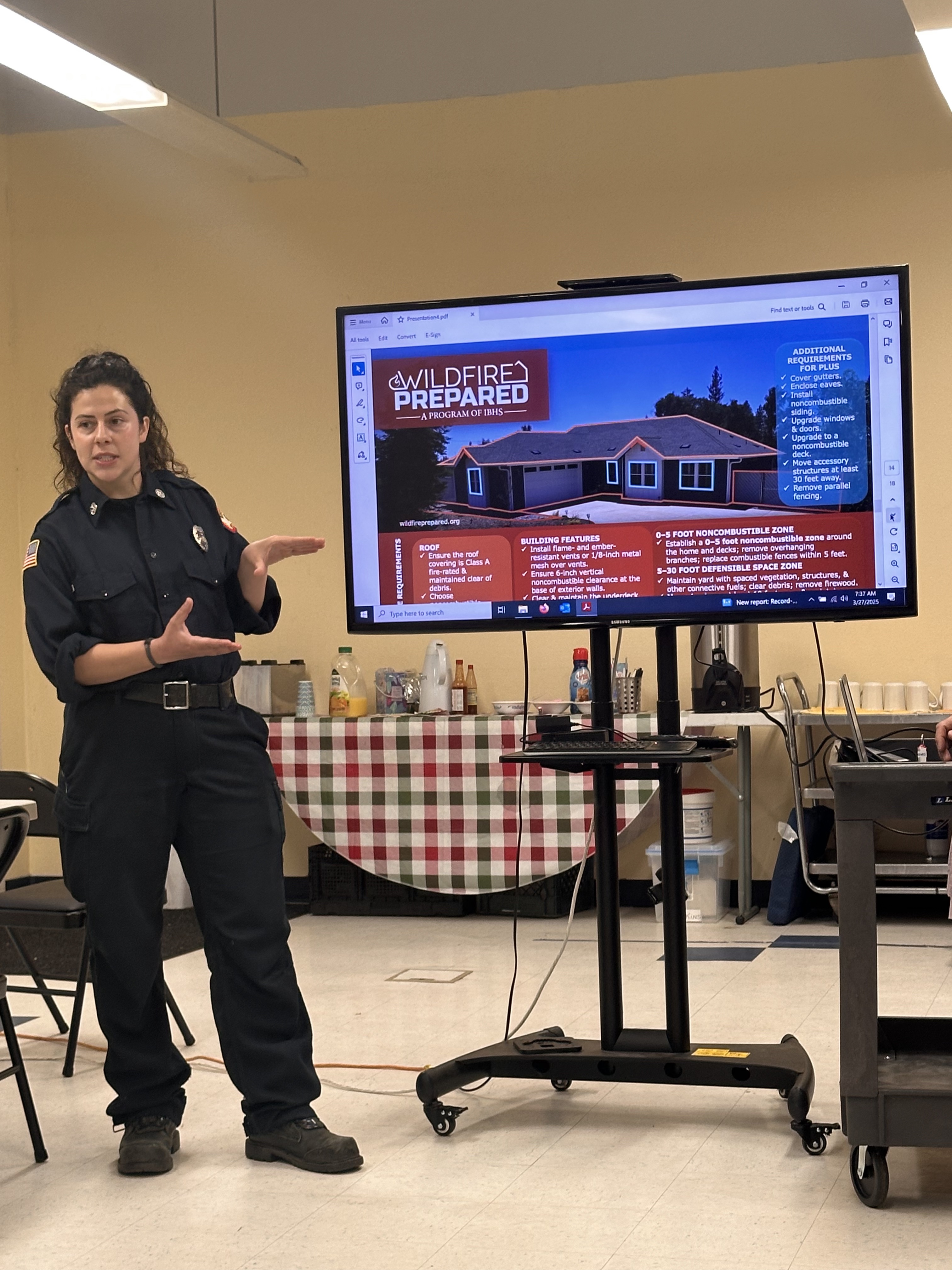 CFPD Fire Marshall Autumn Lancaster and Chief William Sapeta (not pictured) speak about wildfire prevention and preparedness at the judge's breakfast. (Nikki Carboni for the Record-Bee).