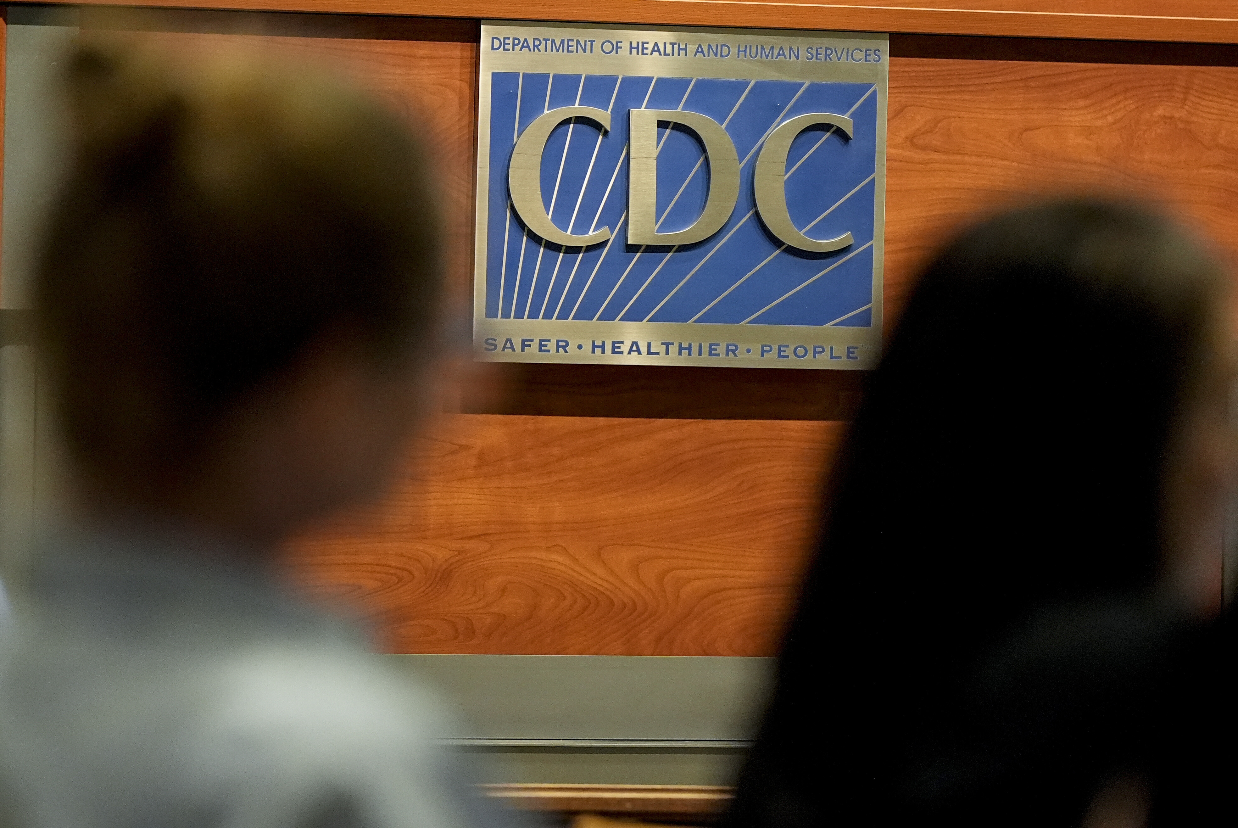 Participants listen during a meeting of the Advisory Committee in Immunization Practices at the CDC, Wednesday, June 25, 2025, in Atlanta. (AP Photo/Mike Stewart)