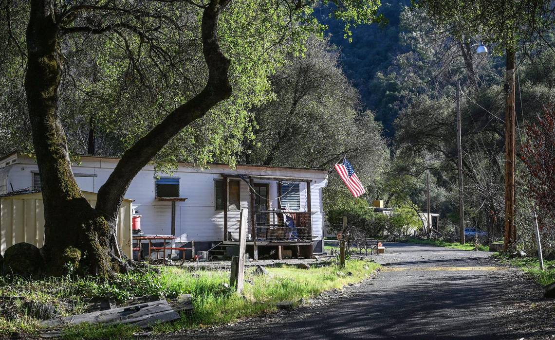 Mobile homes line a quiet street in the El Portal Trailer Park near Yosemite National Park on Sunday, March 13, 2022.