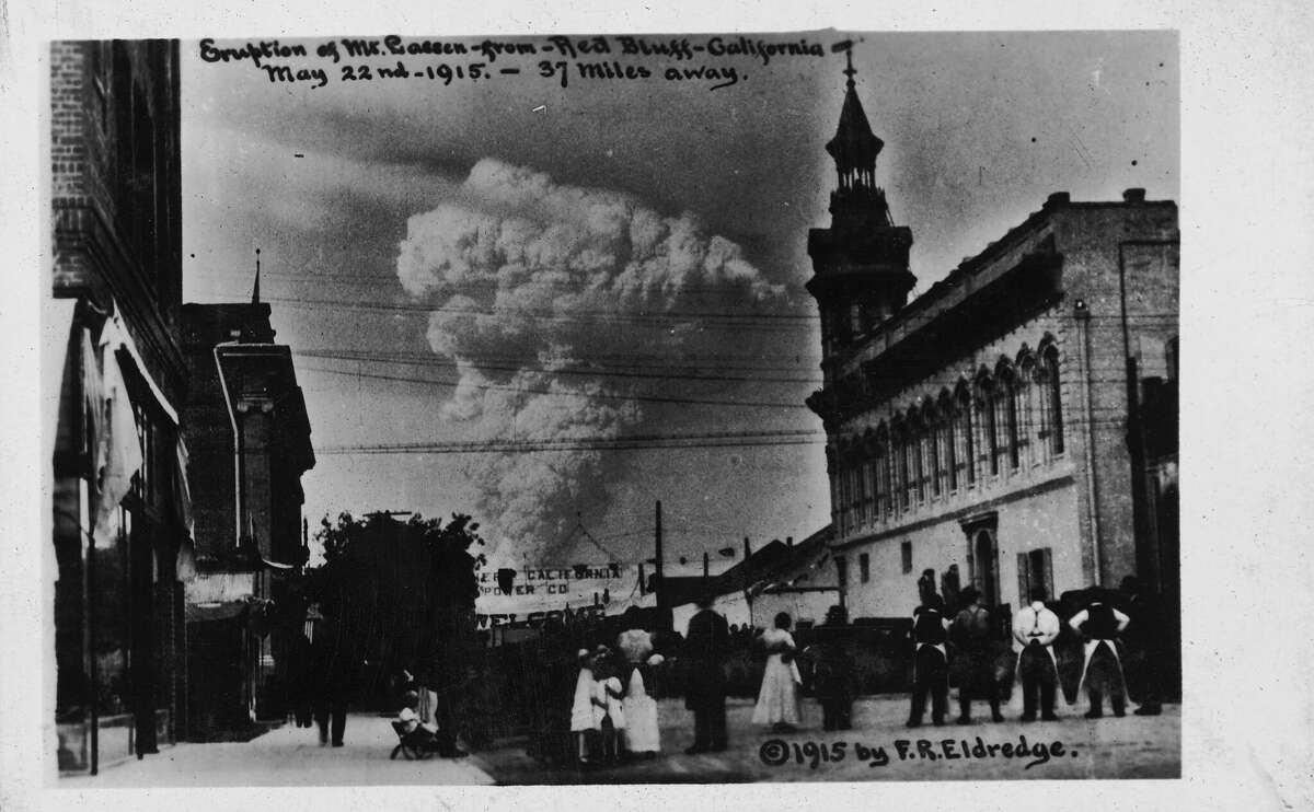 A photographic postcard shows Lassen Peak erupting from downtown Red Bluff in 1915.