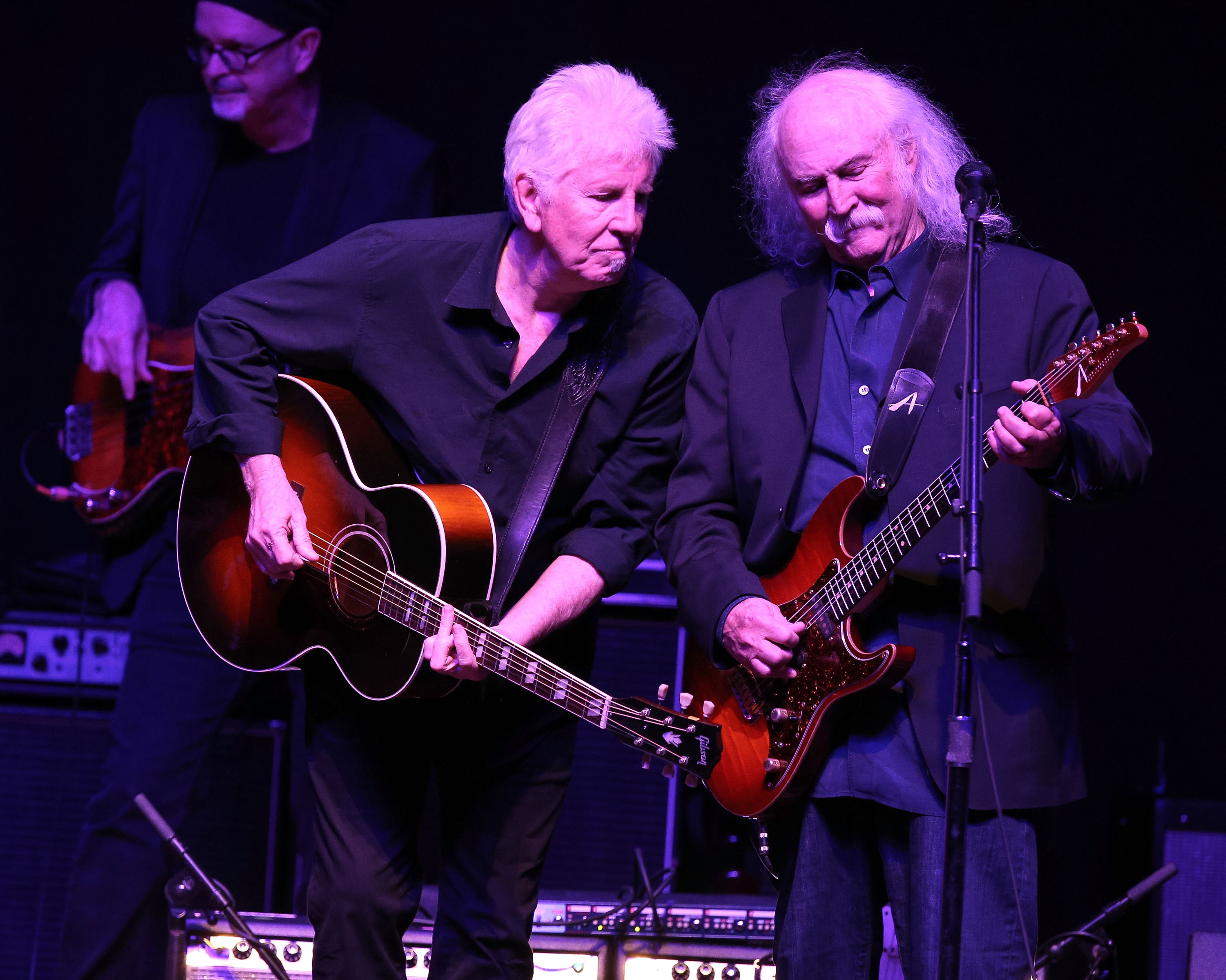 Musicians Graham Nash, left, and David Crosby perform onstage at the 2nd Light Up The Blues Concert - An Evening Of Music To Benefit Autism Speaks at The Theatre At Ace Hotel on April 5, 2014 in Los Angeles.