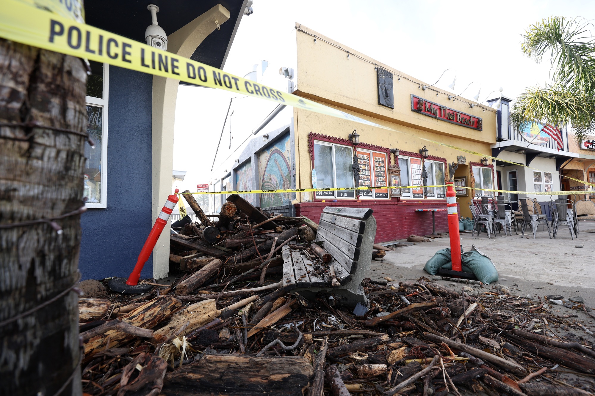 Debris is seen piled up in front of a restaurant following a massive storm that hit the area on Jan. 6, 2023 in Capitola, Calif.