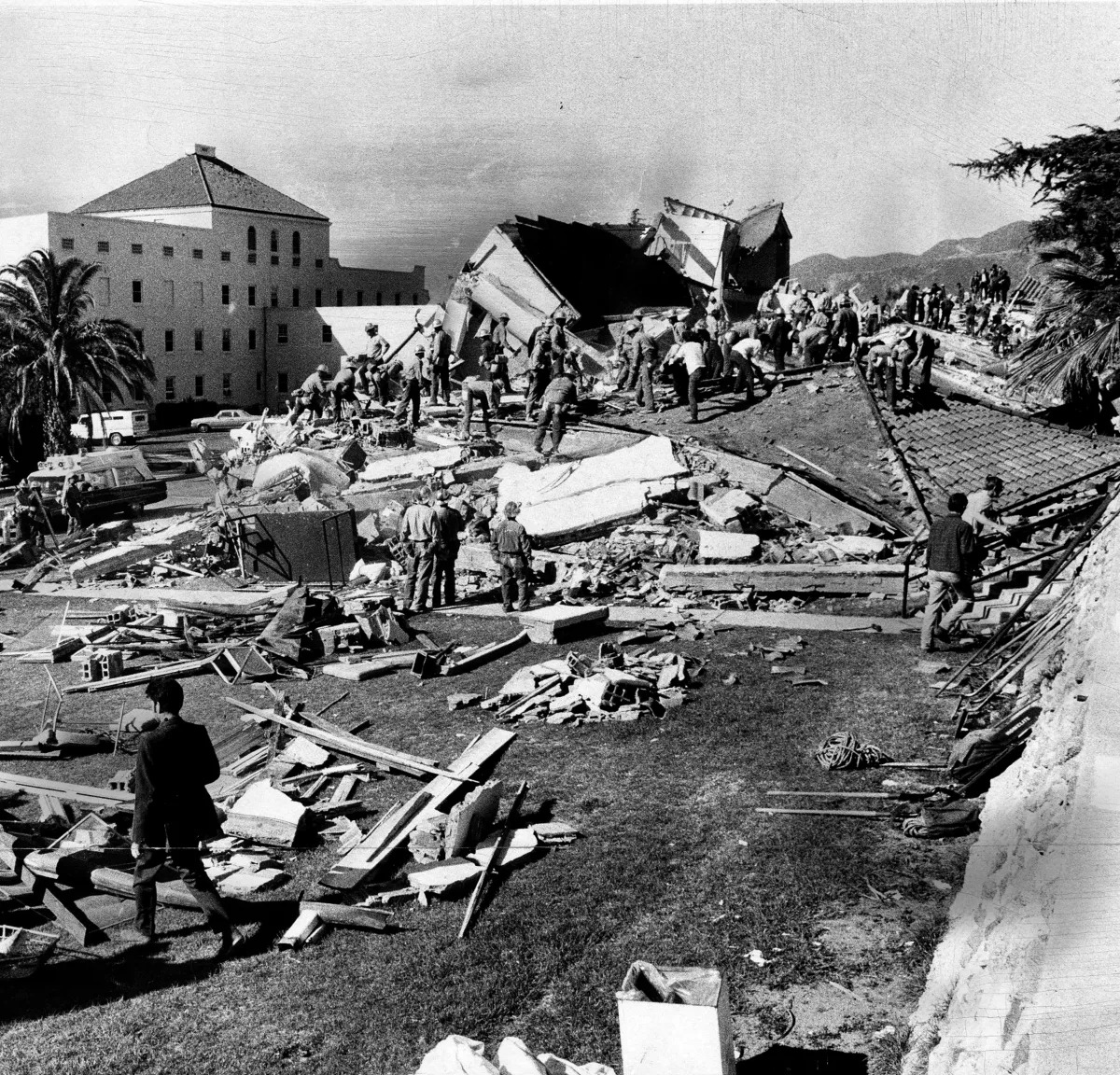 Workers swarm the ruins of the Veterans Administration Hospital in Sylmar, which collapsed in the 1971 earthquake.
