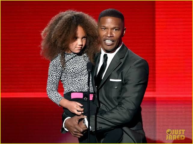 Jamie Foxx and Annalise Bishop on stage