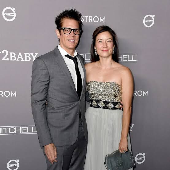 Melanie Lynn Clapp and her husband, Johnny Knoxville at an event