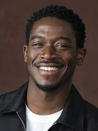 Damson Idris smiling