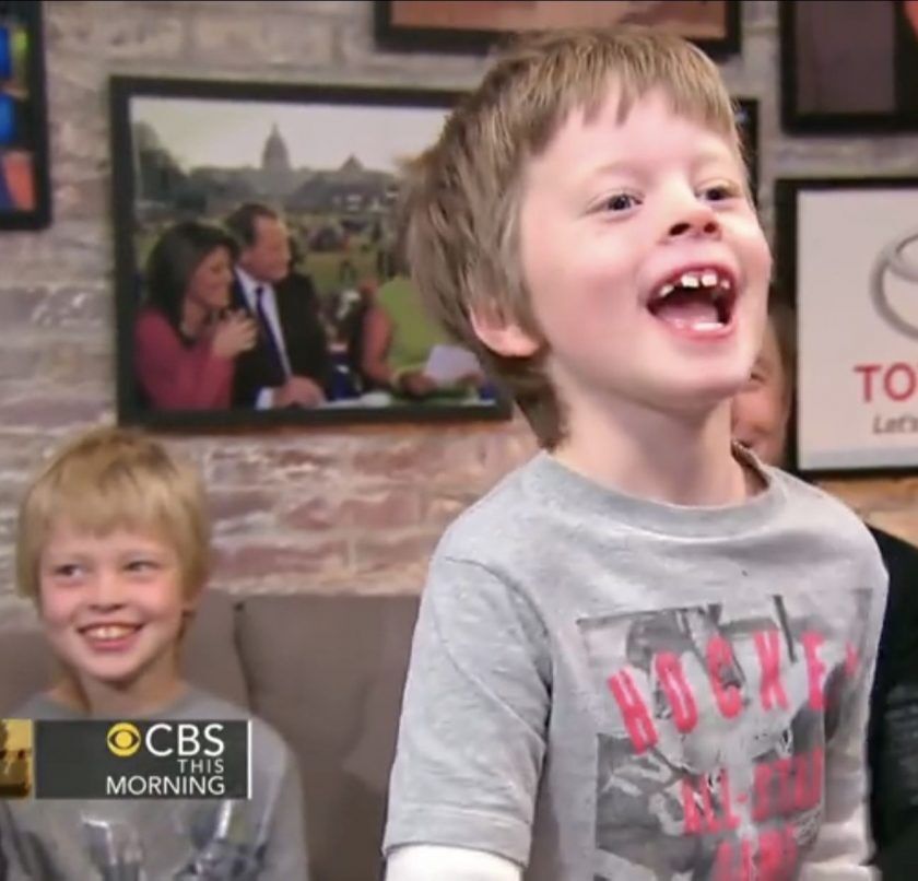 a younger Damian Musk laughing with his brothers