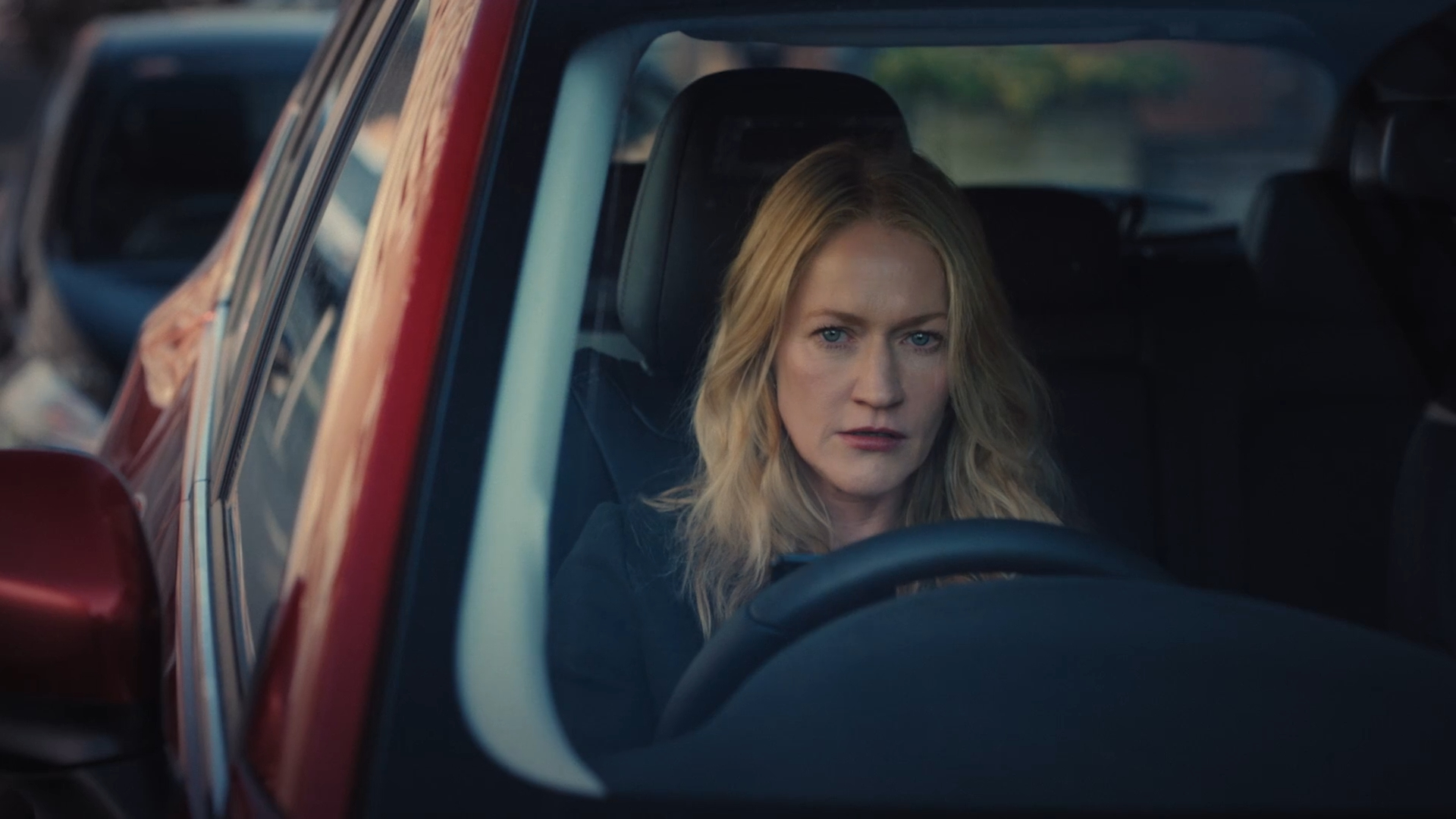 Paula Malcomson in a car