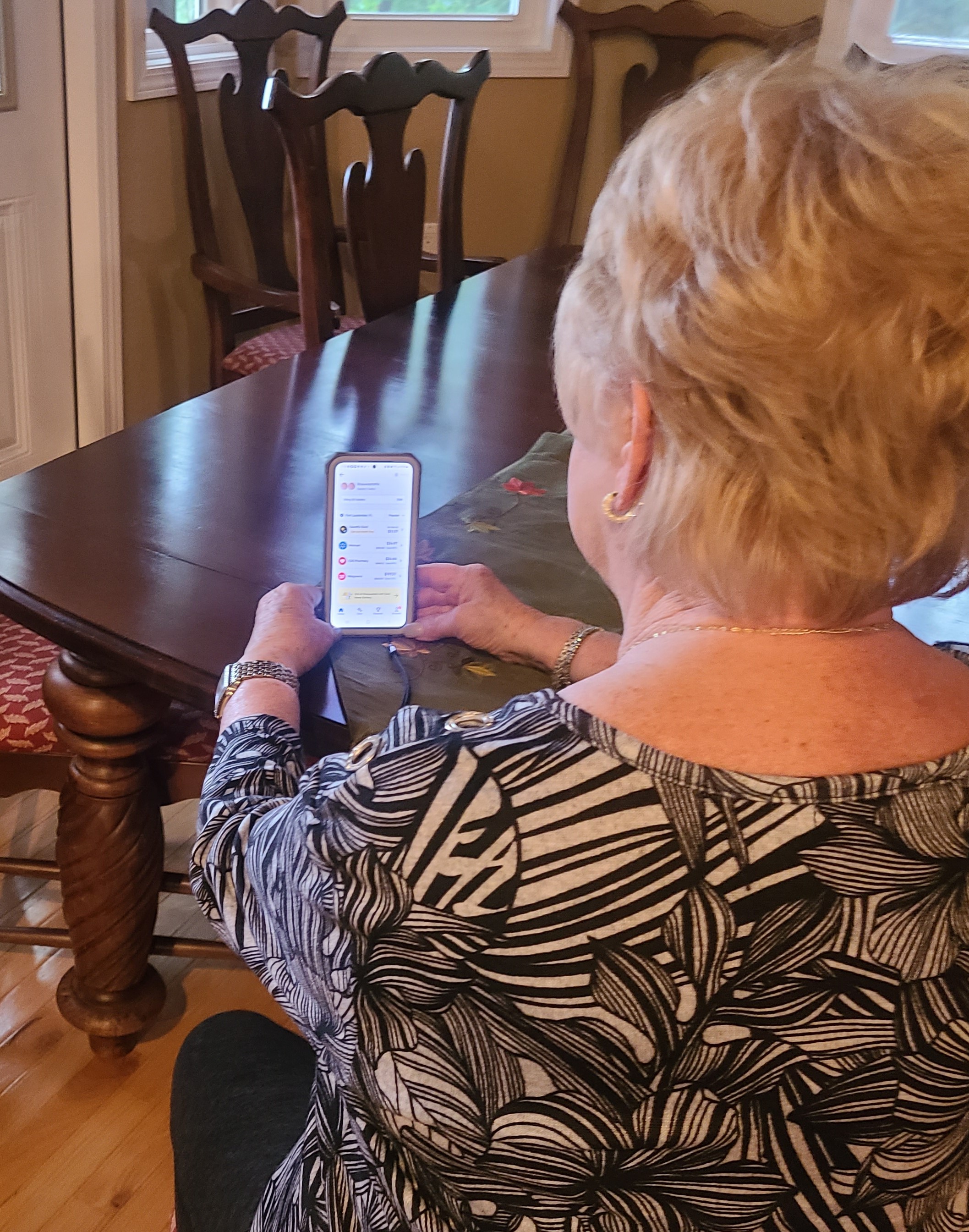 Cherie Davison of Weston uses the GoodRx app to shop for the best prices on her prescription medications.