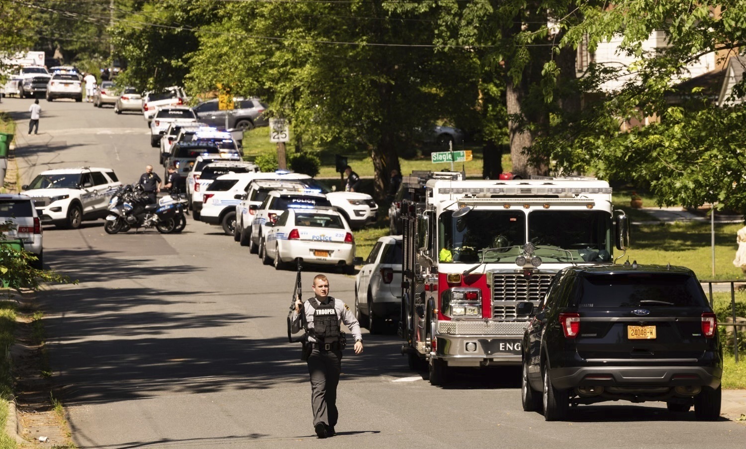 Law enforcement vehicles respond to the April 29 shooting in Charlotte