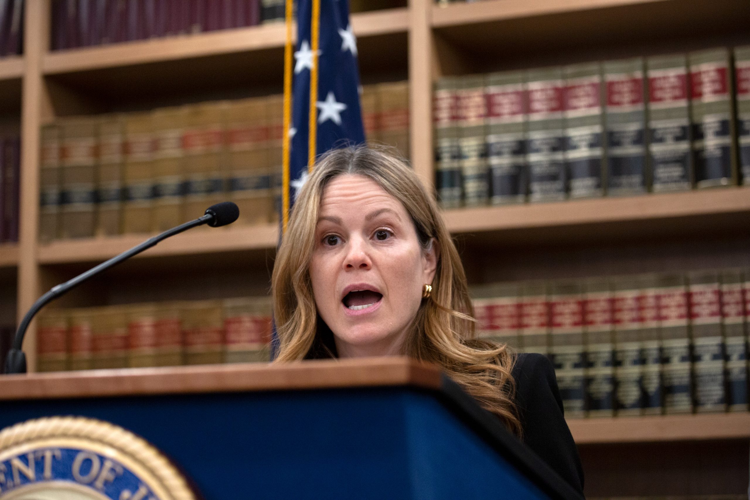 Department of Investigation Commissioner Jocelyn Strauber speaks at the Jacob Javits Federal Building about bribery charges brought against 70 NYCHA superintendents.