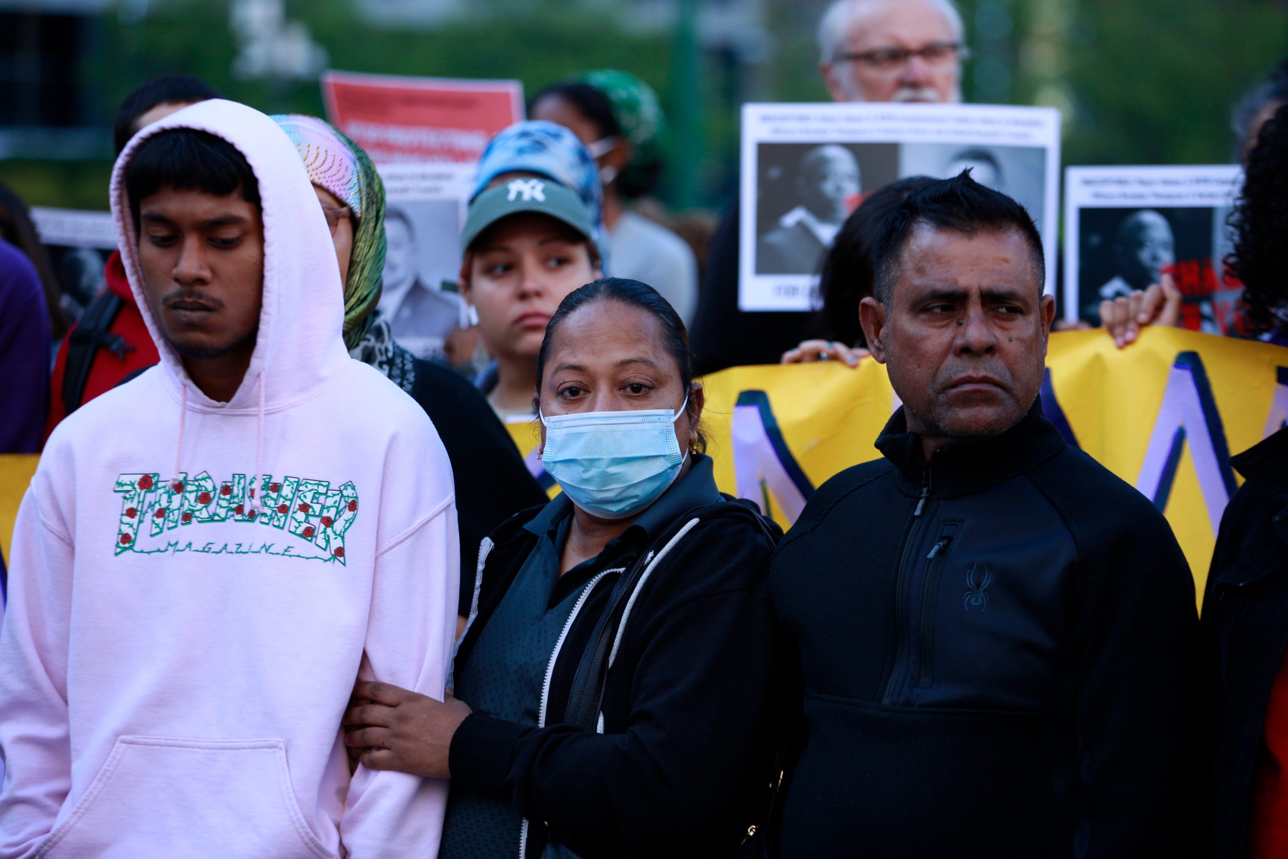 The family of Win Rozario, including his brother, Utsho Rozario, left, attend a rally for Kawaski Trawick after Win was also killed by NYPD officers.