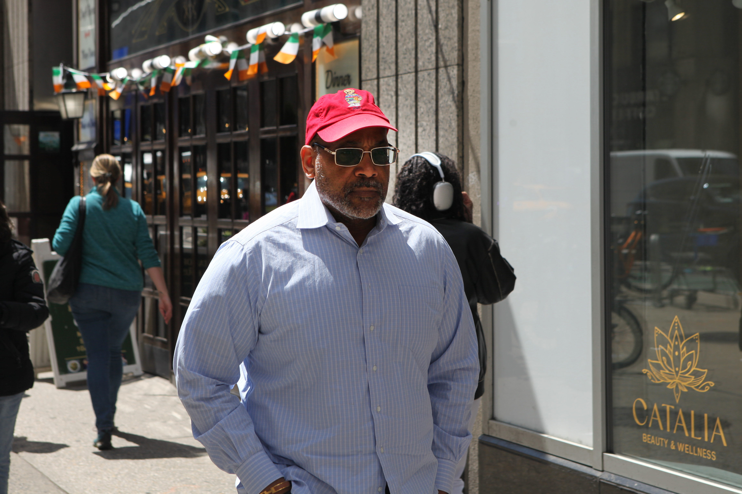 Former State Senator John Sampson walks near his Midtown office.