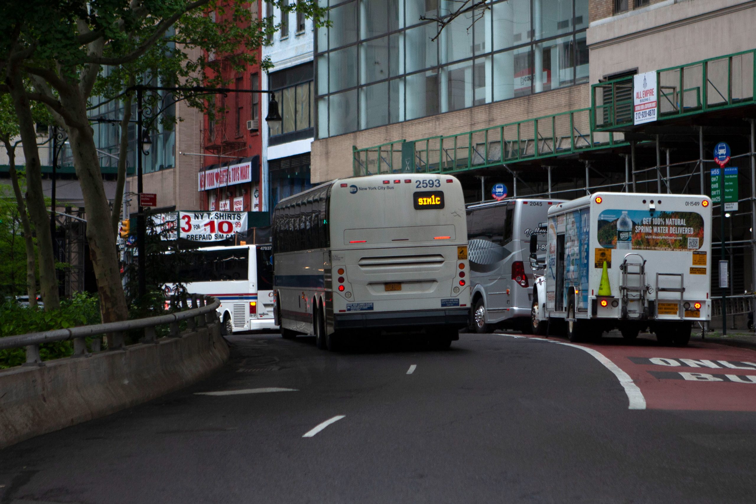 A Staten Island express bus moves through Lower Manhattan.