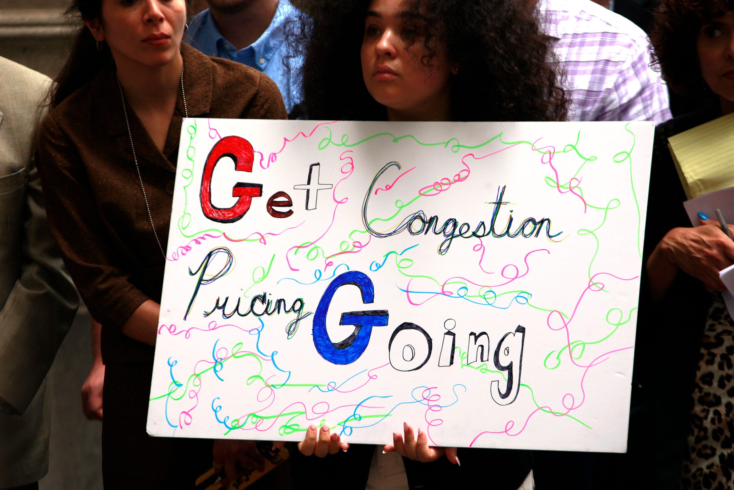 Congestion pricing proponents joined a rally with Comptroller Brad lander outside the Municipal Building.