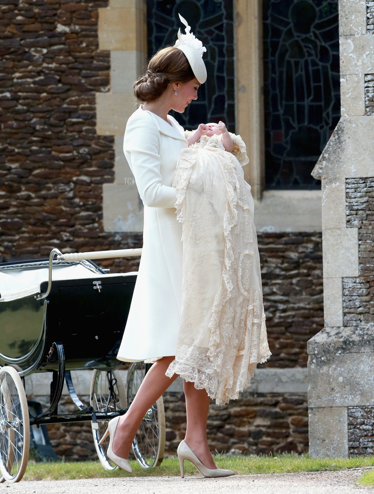 Catherine, Duchess of Cambridge and Princess Charlotte of Cambridge arrive at the Church of St Mary Magdalene on the Sandringham Estate for the Christening of Princess Charlotte of Cambridge on July 5, 2015 in King's Lynn, England