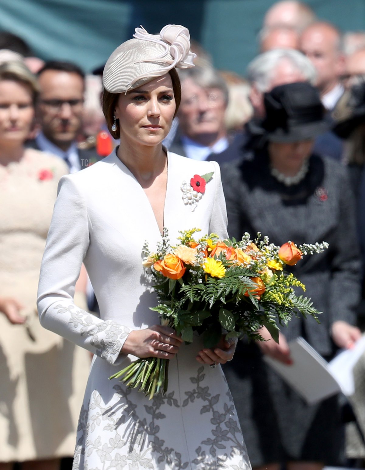 Catherine, Duchess of Cambridge with flowers during a ceremony at the Commonwealth War Graves Commisions's Tyne Cot Cemetery on July 31, 2017 in Ypres, Belgium. The commemorations mark the centenary of Passchendaele - The Third Battle of Ypres