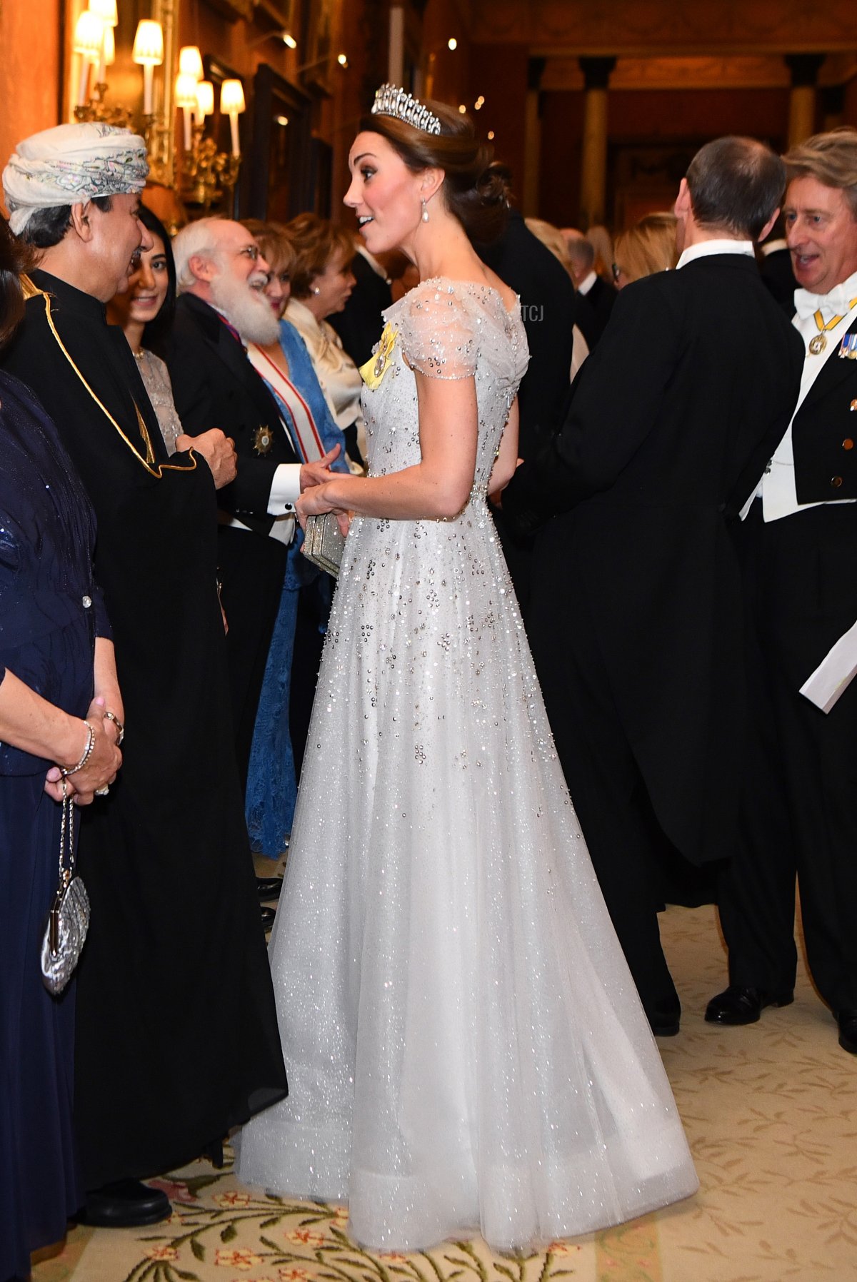 Catherine, Duchess of Cambridge greets guests at an evening reception for members of the Diplomatic Corps at Buckingham Palace on December 04, 2018 in London, England