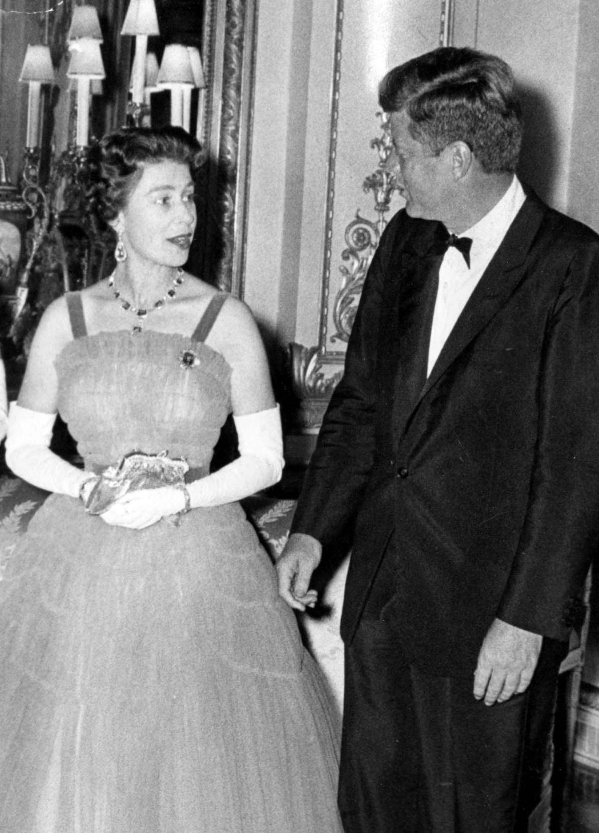 Queen Elizabeth II and President John F. Kennedy are pictured ahead of a dinner at Buckingham Palace in London on June 5, 1961 (Keystone Press/Alamy)