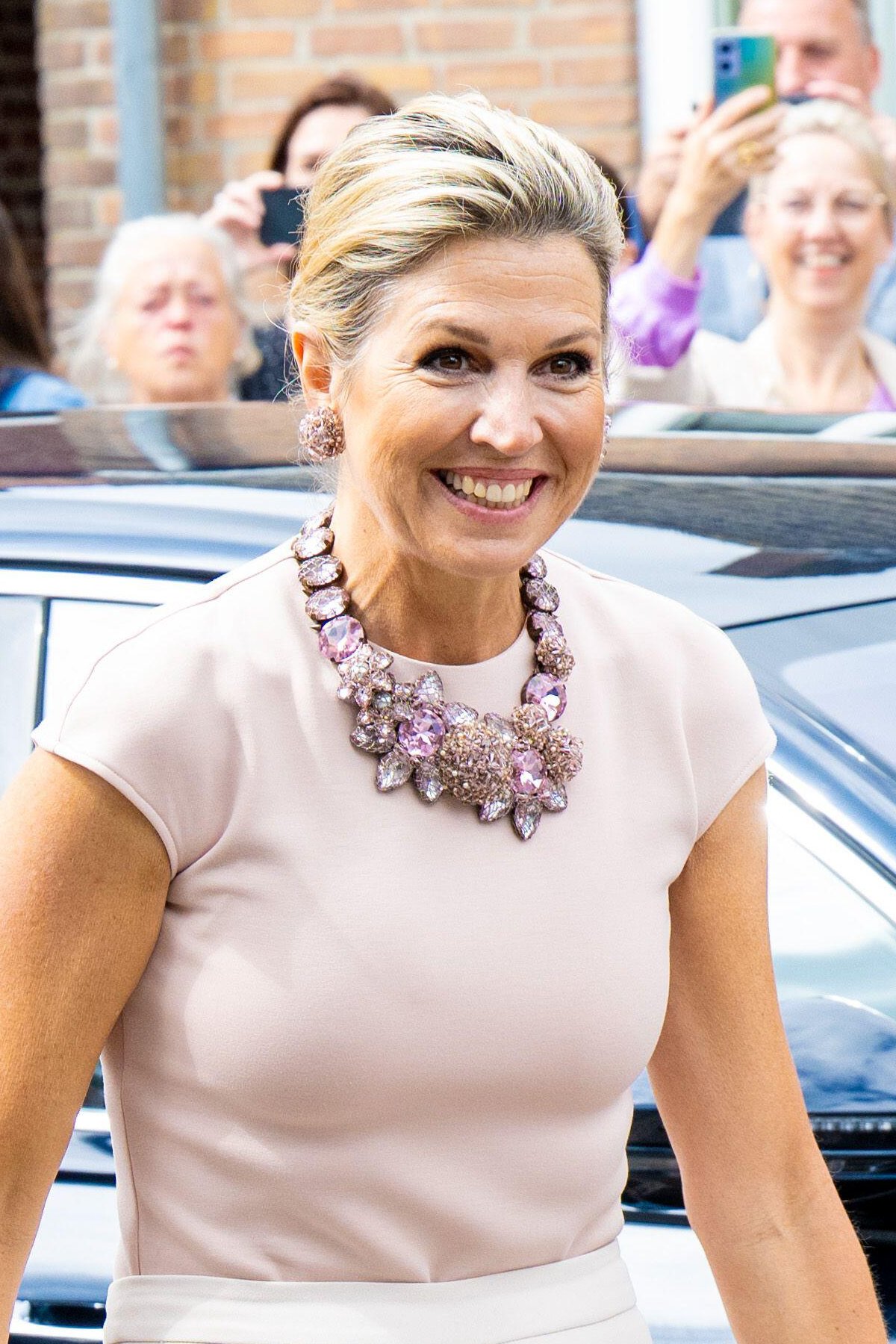 The Queen of the Netherlands is pictured during a visit to Zevenbergschen Hoek in the municipality of Moerdijk on July 4, 2024 (Patrick van Emst/Bruno Press/Alamy)