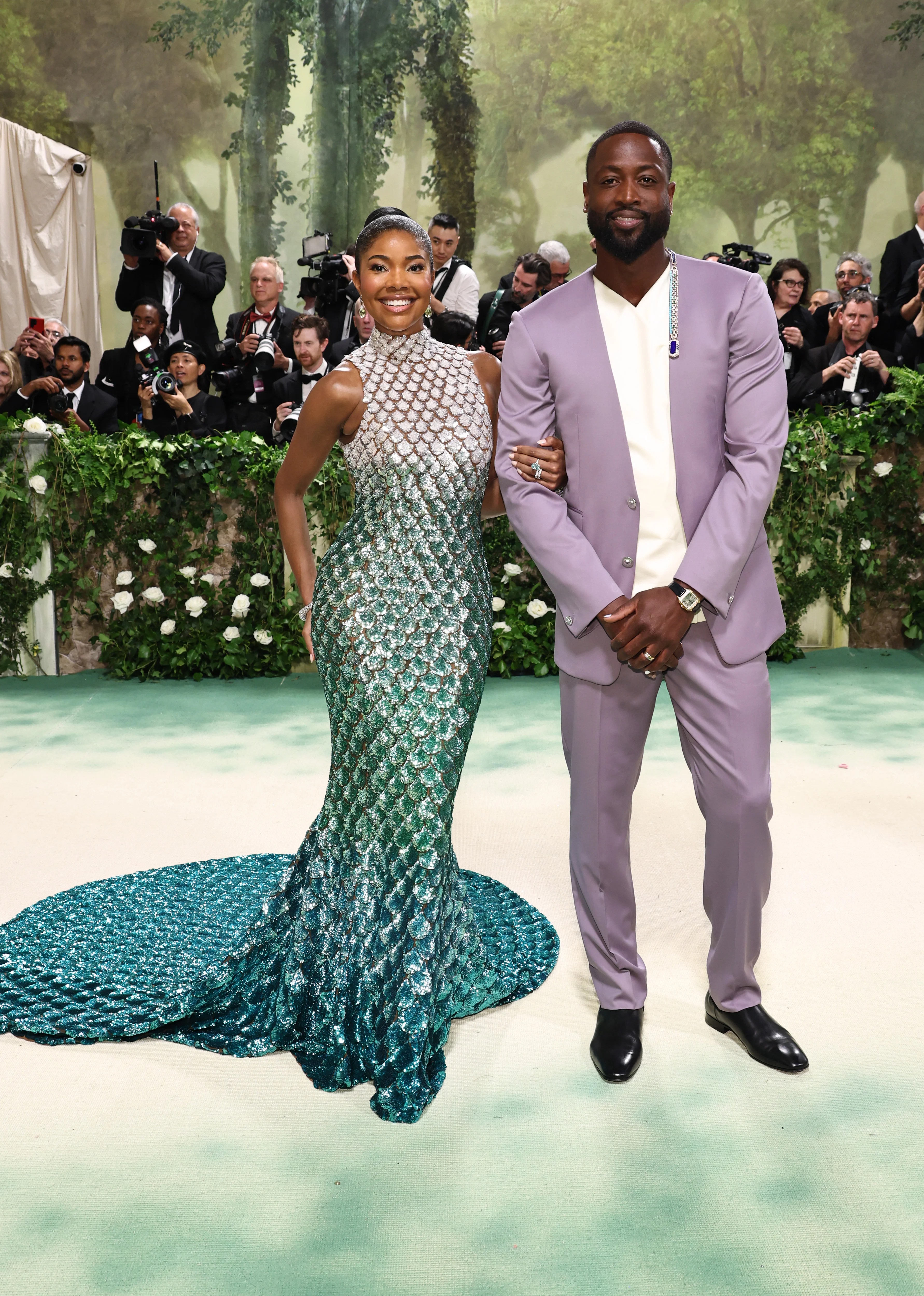 Gabrielle Union and Dwyane Wade attend The 2024 Met Gala Celebrating "Sleeping Beauties: Reawakening Fashion" at The Metropolitan Museum of Art on May 06, 2024 in New York City.