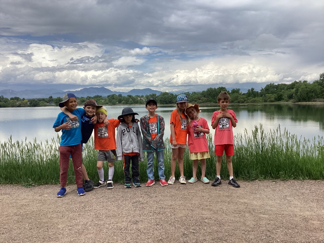 An image of children standing in front of Waneka Lake