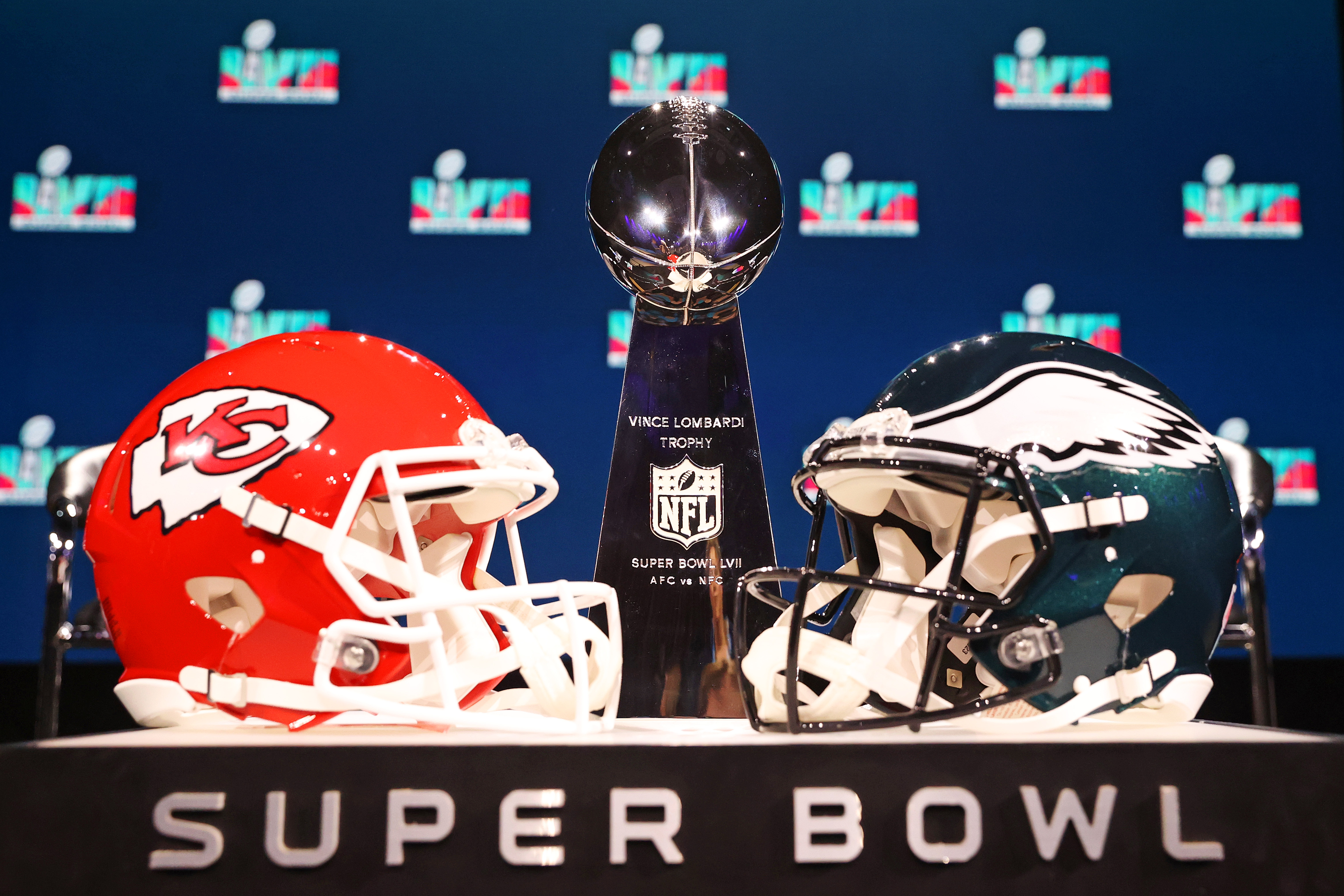 PHOENIX, ARIZONA - FEBRUARY 08: A view of the Vince Lombardi Trophy and the helmets of the Kansas City Chiefs and the Philadelphia Eagles before a press conference for NFL Commissioner Roger Goodell at Phoenix Convention Center on February 08, 2023 in Phoenix, Arizona. (Photo by Peter Casey/Getty Images)