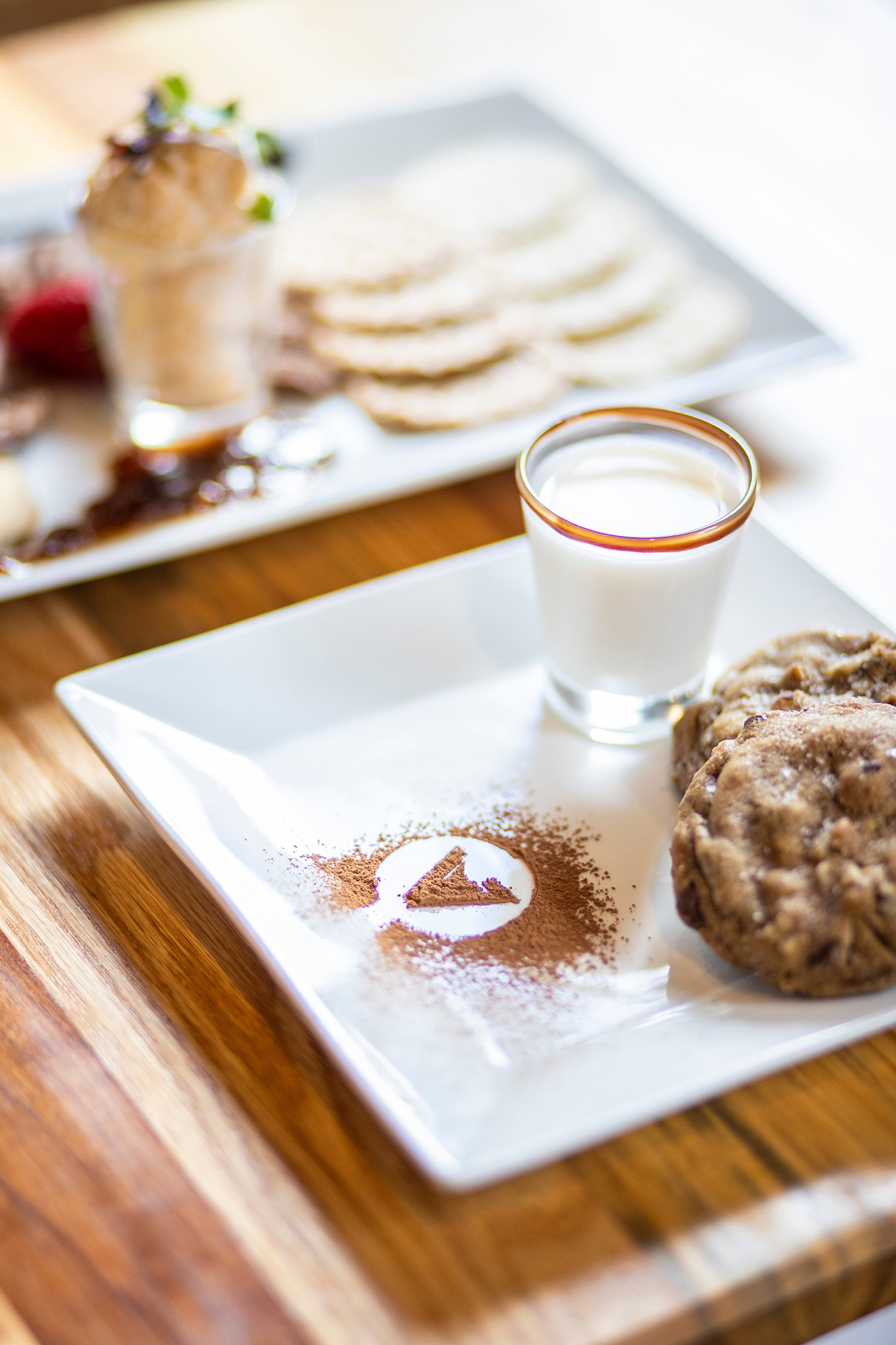 Vance's Bakery Bar, a combination cocktail lounge and cozy bakery, offers sweet desserts and cocktails in Augusta's vibrant downtown. Here, two warm 2nd City Bourbon-infused chocolate chip cookies are served with a shot of whole milk for an adult-style version of milk and cookies. (Visit Augusta/TNS)