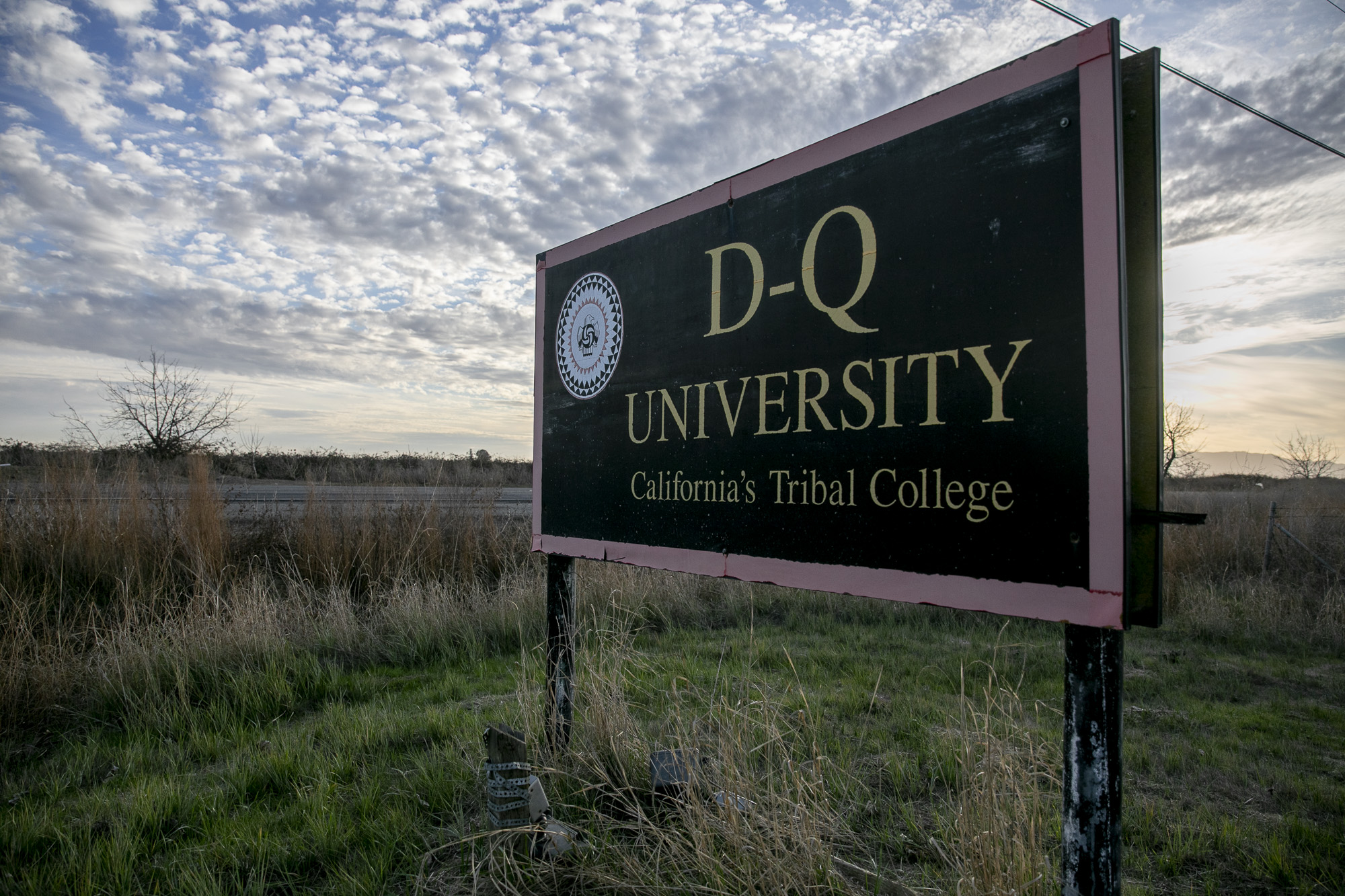 The sign for D-Q University remains standing along Country Road 31 in Yolo County on January 21, 2021. Photo by Anne Wernikoff, CalMatters