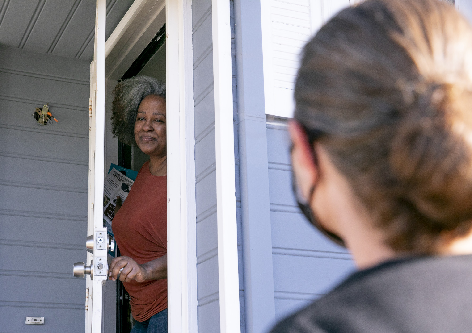 Oakland resident Leta Smith speaks with union volunteer Jennifer Shanoski about the recall Newsom recall.