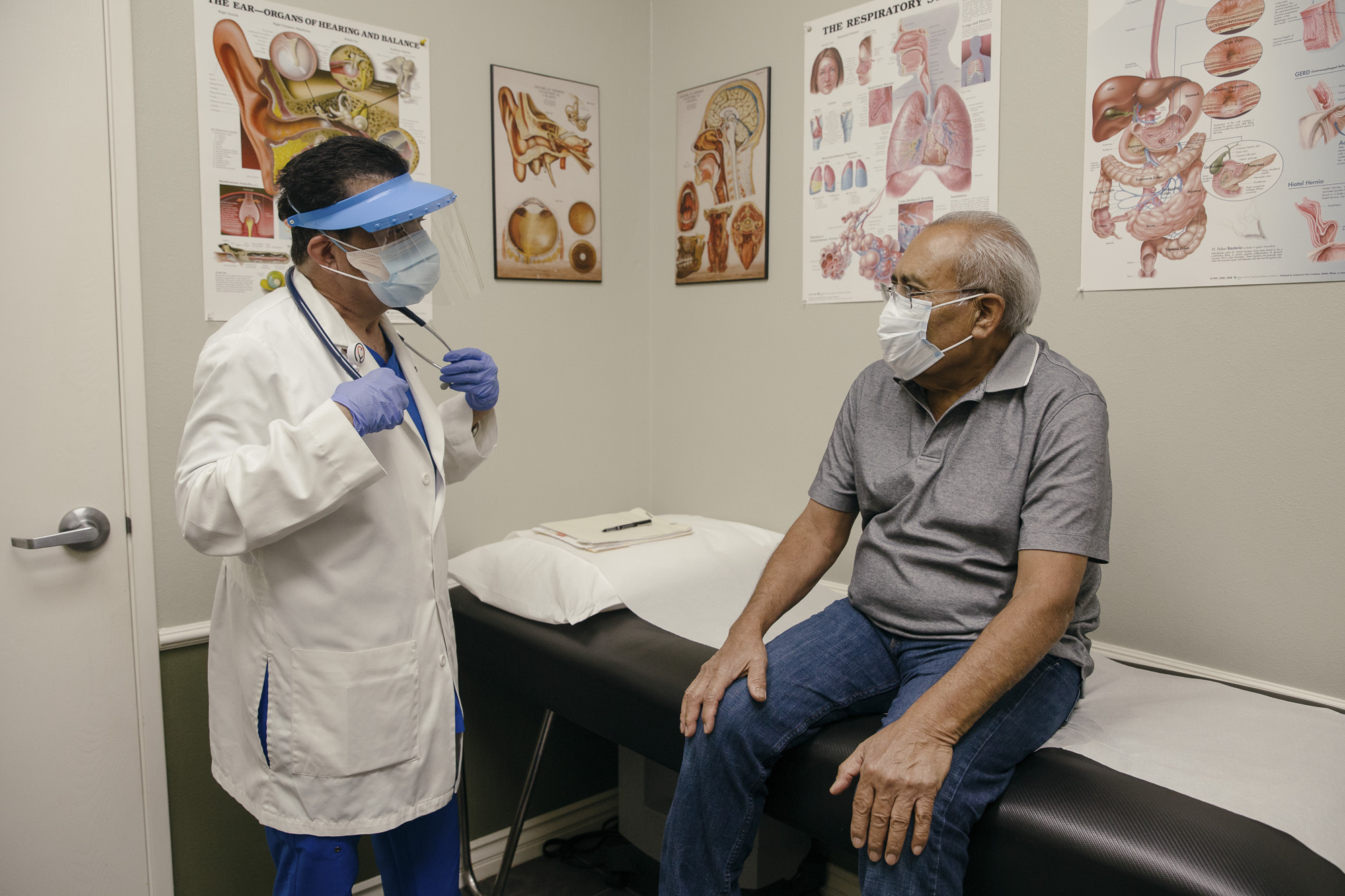 Dr. Shura Alexis Moreno has an office visit with patient Carlos Altamirano at Gabriel Medical Center in East Los Angeles on Sept. 14, 2021. Dr. Moreno was one of the COVID-19 patients to receive a lung transplant. Photo by Jessica Pons for CalMatters